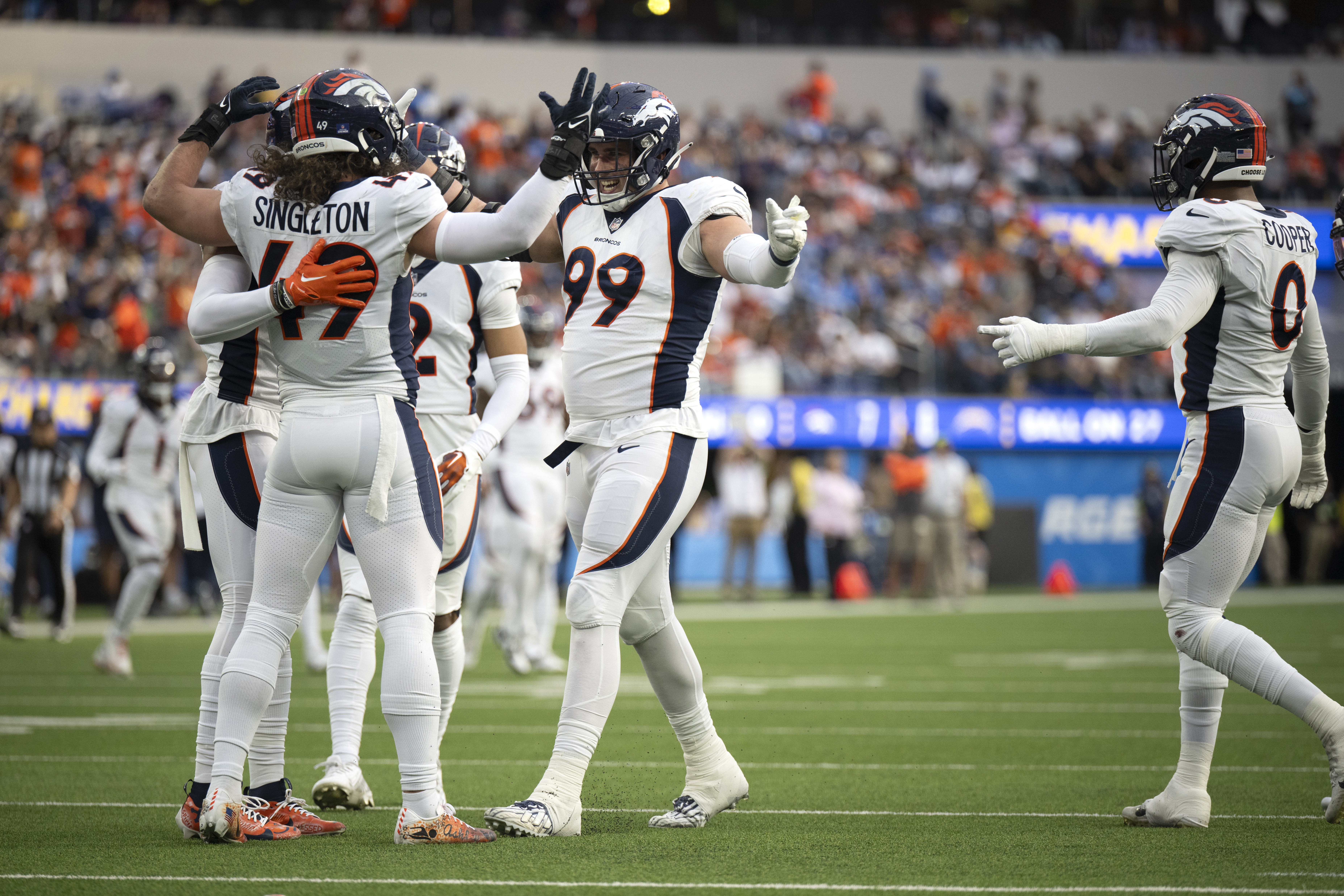 Denver Broncos defensive end Zach Allen (99) celebrates his sack during an NFL football game against the Los Angeles Chargers, Sunday, Dec. 10, 2023, in Inglewood, Calif. (AP Photo/Kyusung Gong) (Kyusung Gong)