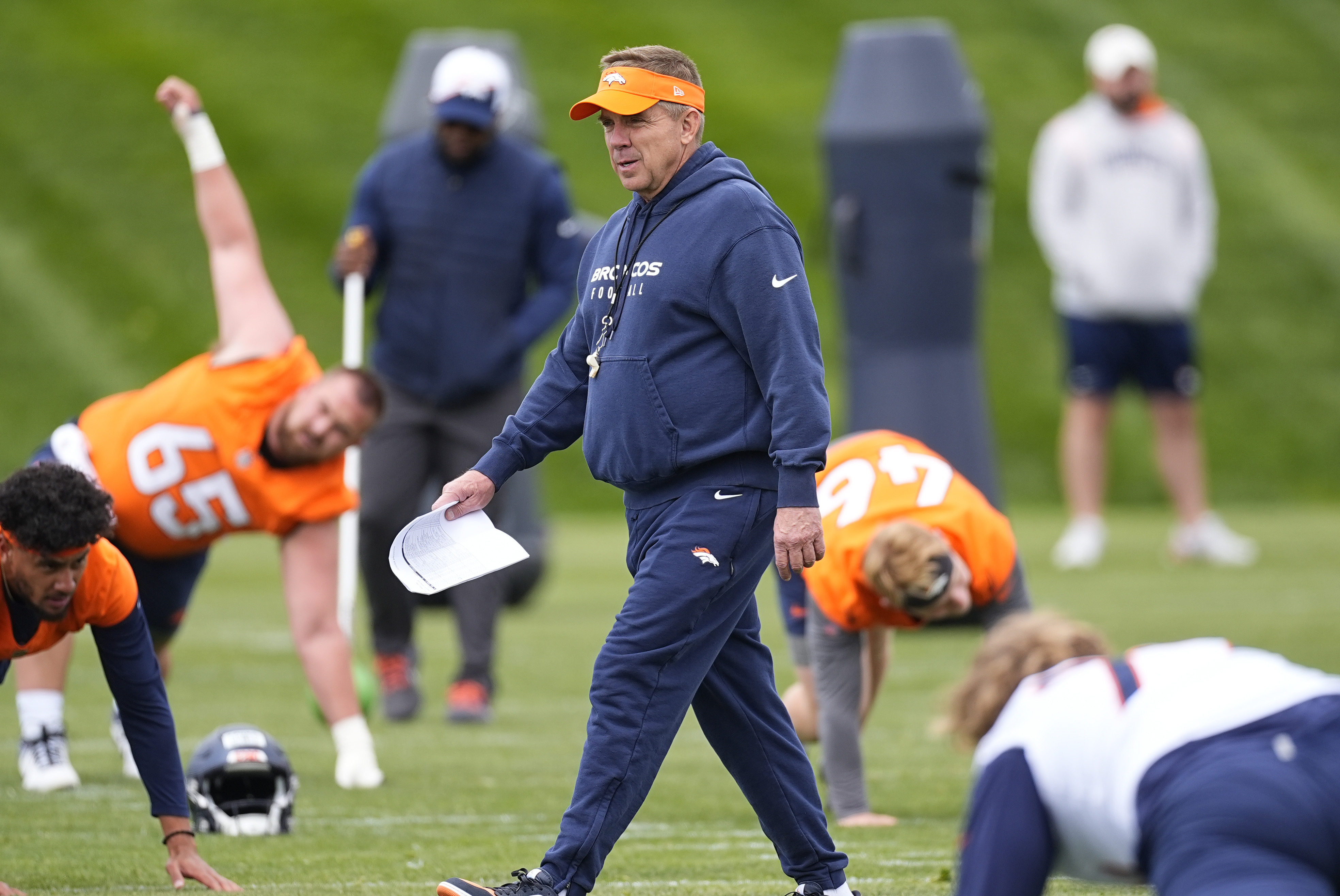 Denver Broncos head coach Sean Payton takes part in a drill during an NFL rookie minicamp football practice Saturday, May 11, 2024, in Centennial, Colo. (AP Photo/David Zalubowski) (David Zalubowski)