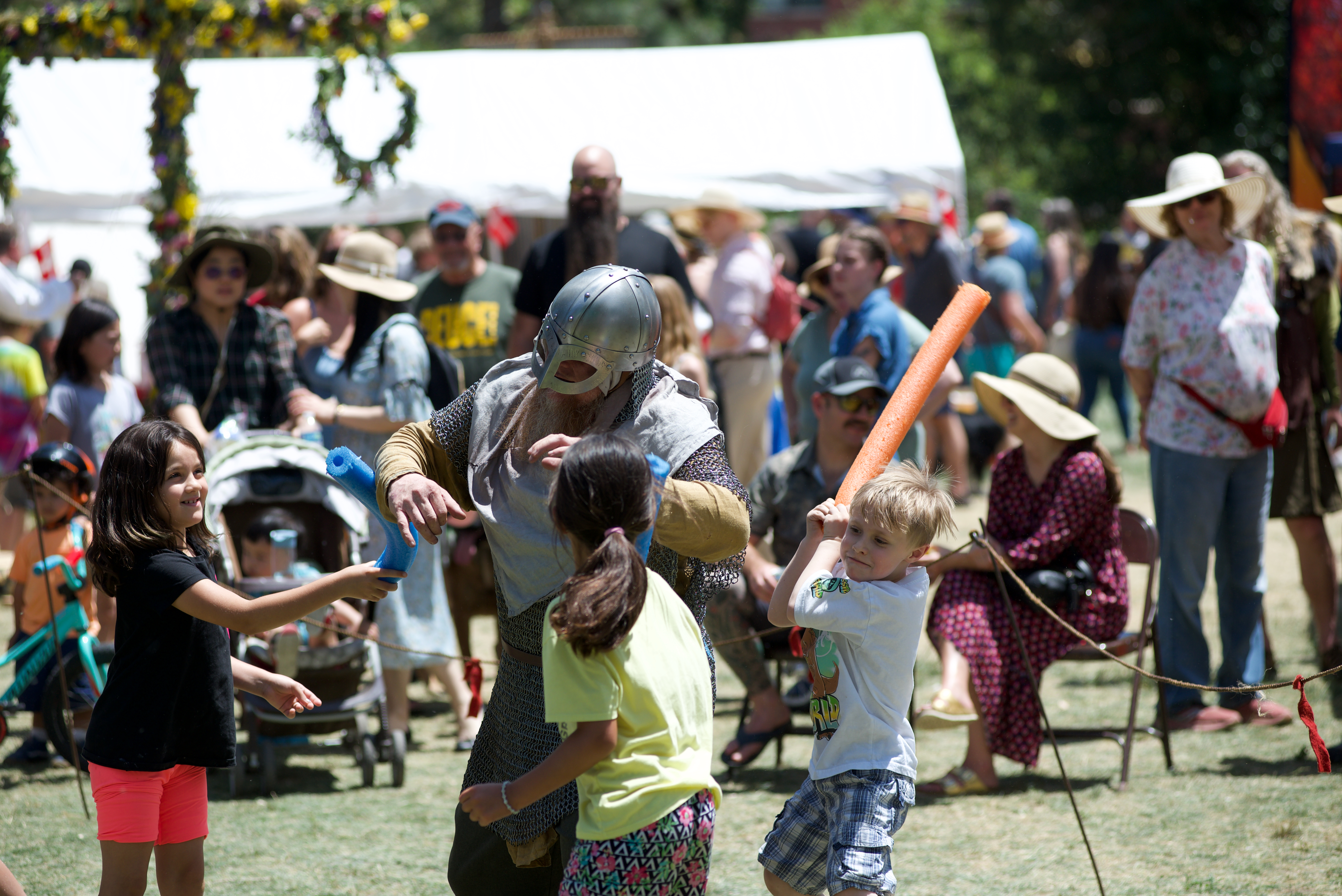 A member of the Fjellborg Vikings falls in battle as he is overwhelmed by the ferocious attacks from pool noodle wielding children on June 16, 2024. (Alex Edwards/The Denver Gazette) (AlexanderEdwardsBusiness Reporteralex.edwards@gazette.comhttps://secure.gravatar.com/avatar/dbaa50cc8a9183e280c297e3afa72ace?d=mm&r=g)