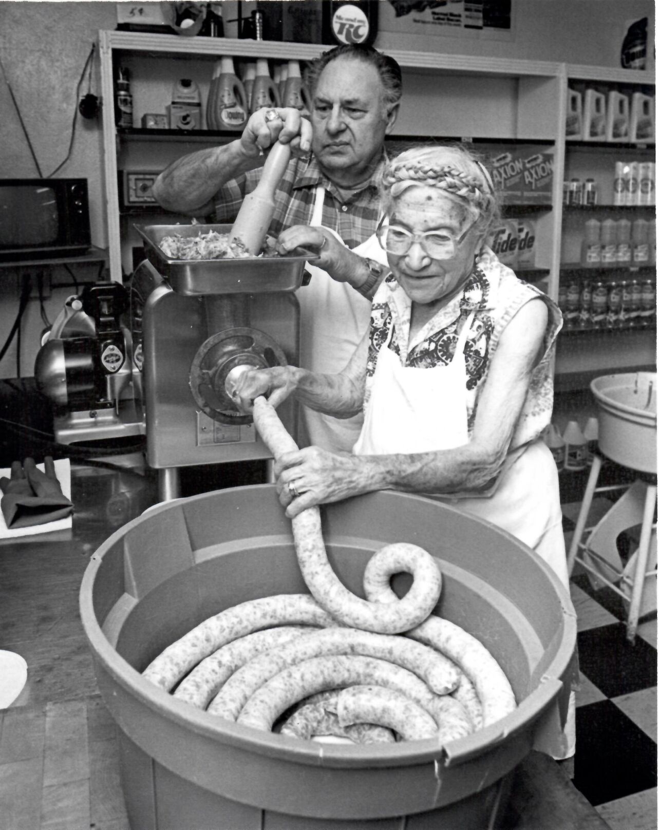 Joe Cortese and Carmella Gagliano pack sausage, a family tradition spanning 100 years at Gagliano’s in Pueblo. The shop originally sold Italian sausage and other meats, cheeses and breads and filled the shelves with imported goods from their native land. For the immigrant laborers and families who settled in Pueblo, Gagliano’s was a taste of home. (Courtesy of Gagliano’s italian market and deli)