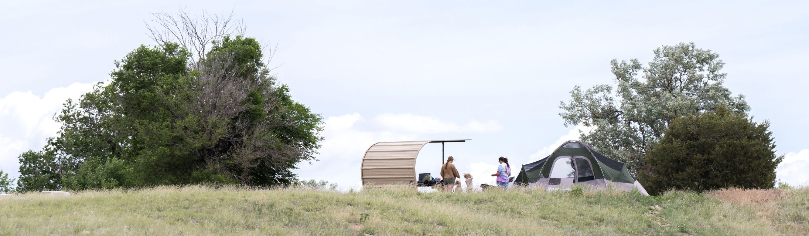 Campers hang out at their site at the South Shore Campground last week, June 4, 2024, at Lake Pueblo State Park. (Christian Murdock, The Gazette)