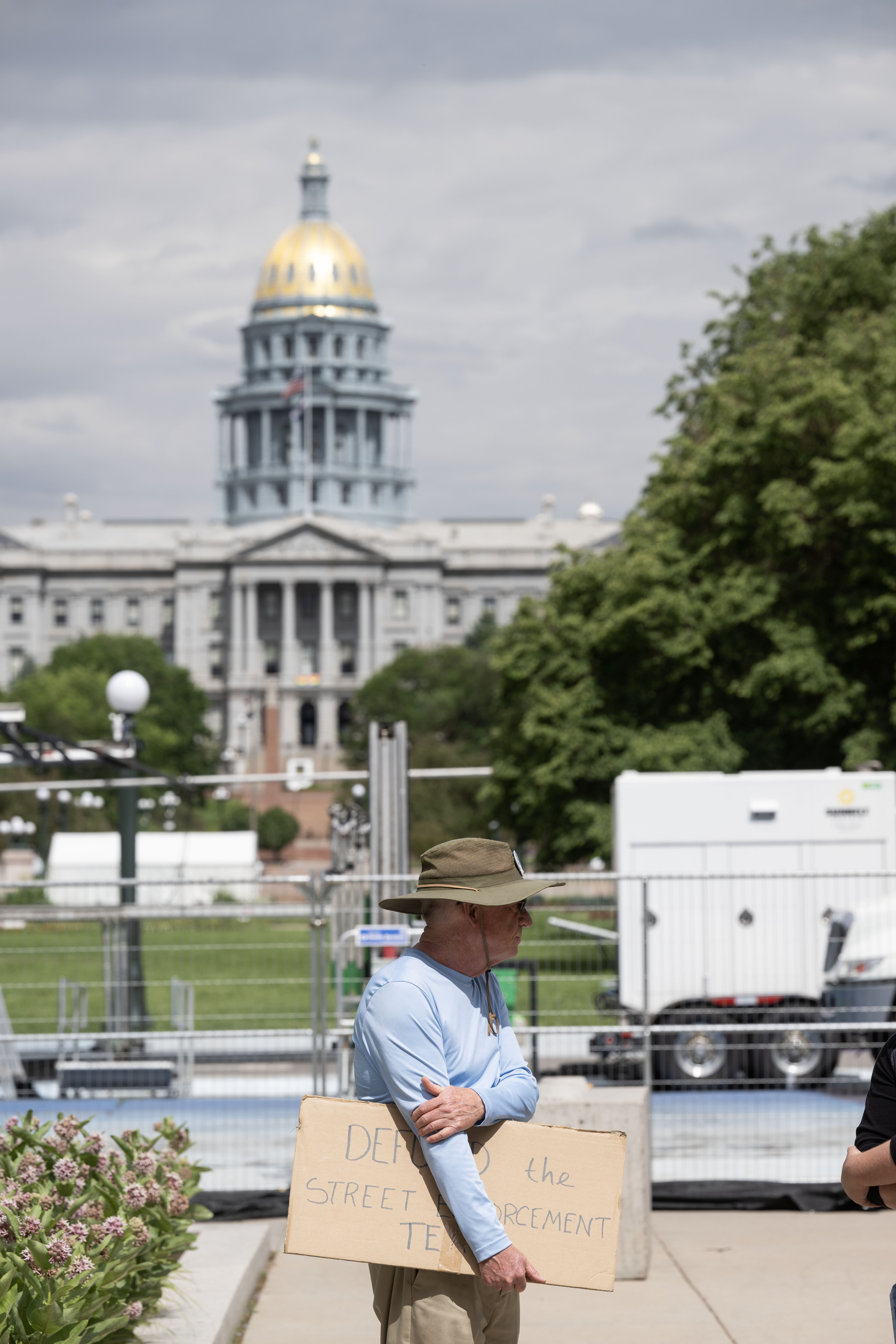 Rick Crewswell holds a sign expressing his position against the city’s handling of the houseless community in Denver during a protest on the steps of the Denver City and County Building on Monday, June 3, 2024. (Stephen Swofford, Denver Gazette) (Stephen Swofford The Gazette)