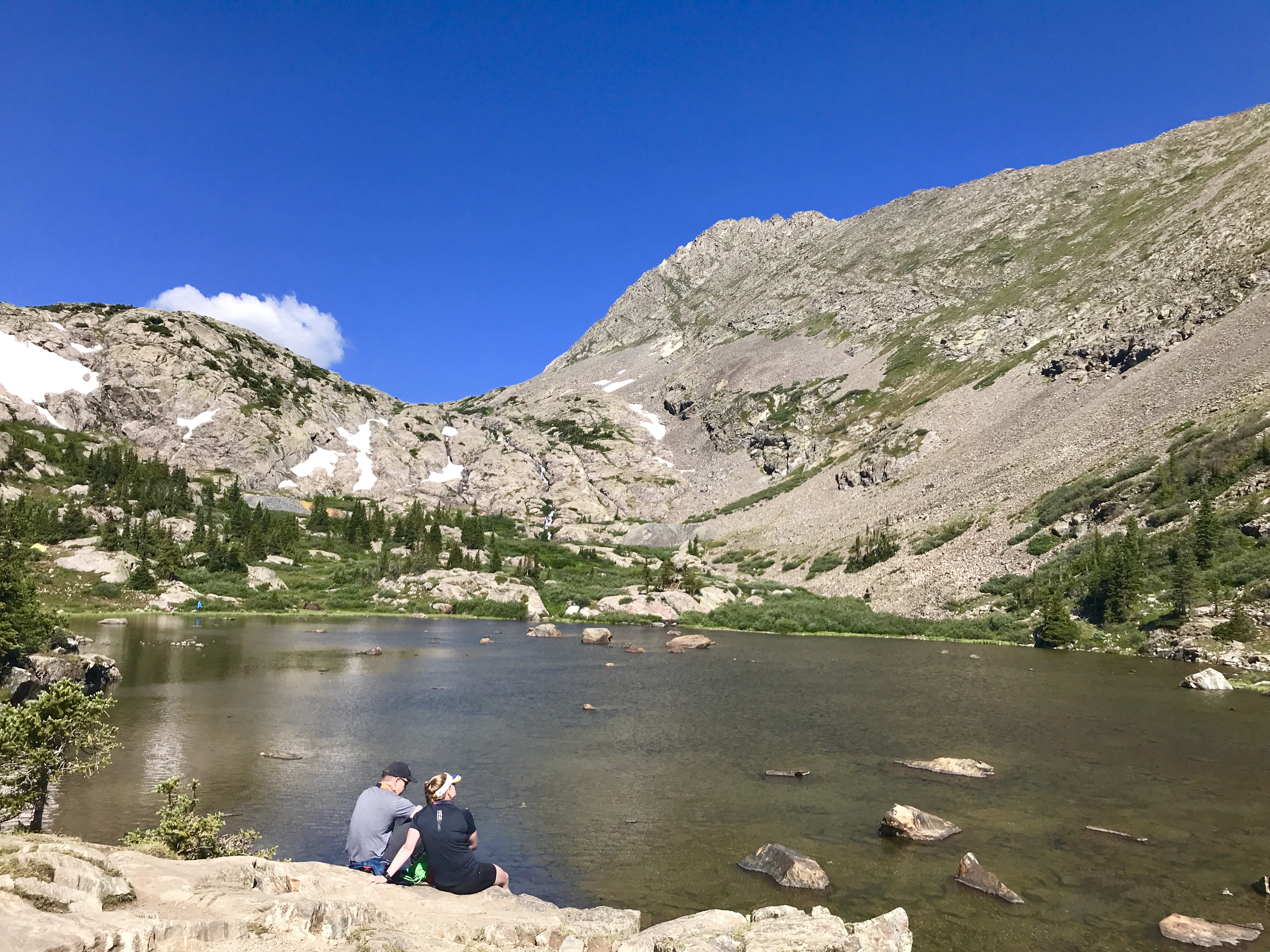 Hikers rest on the shores of Mohawk Lake outside Breckenridge. (Seth Boster/The Gazette)