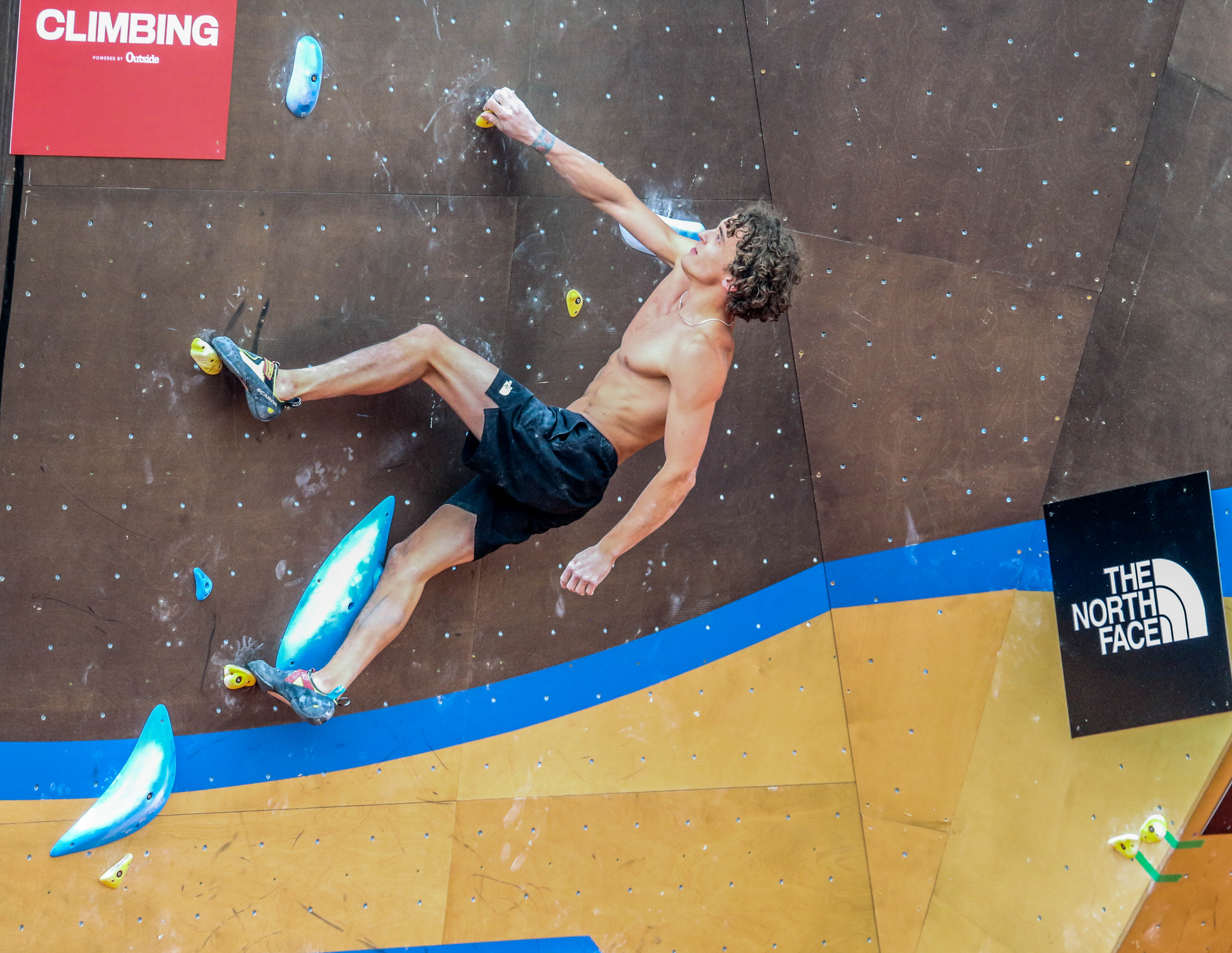 Professional climber Christopher Cosser takes part in a tandem competition in Civic Center Park for the inaugural Outside Festival on Saturday, June 1, 2024. (John Moore, The Denver Gazette) (John Moore)