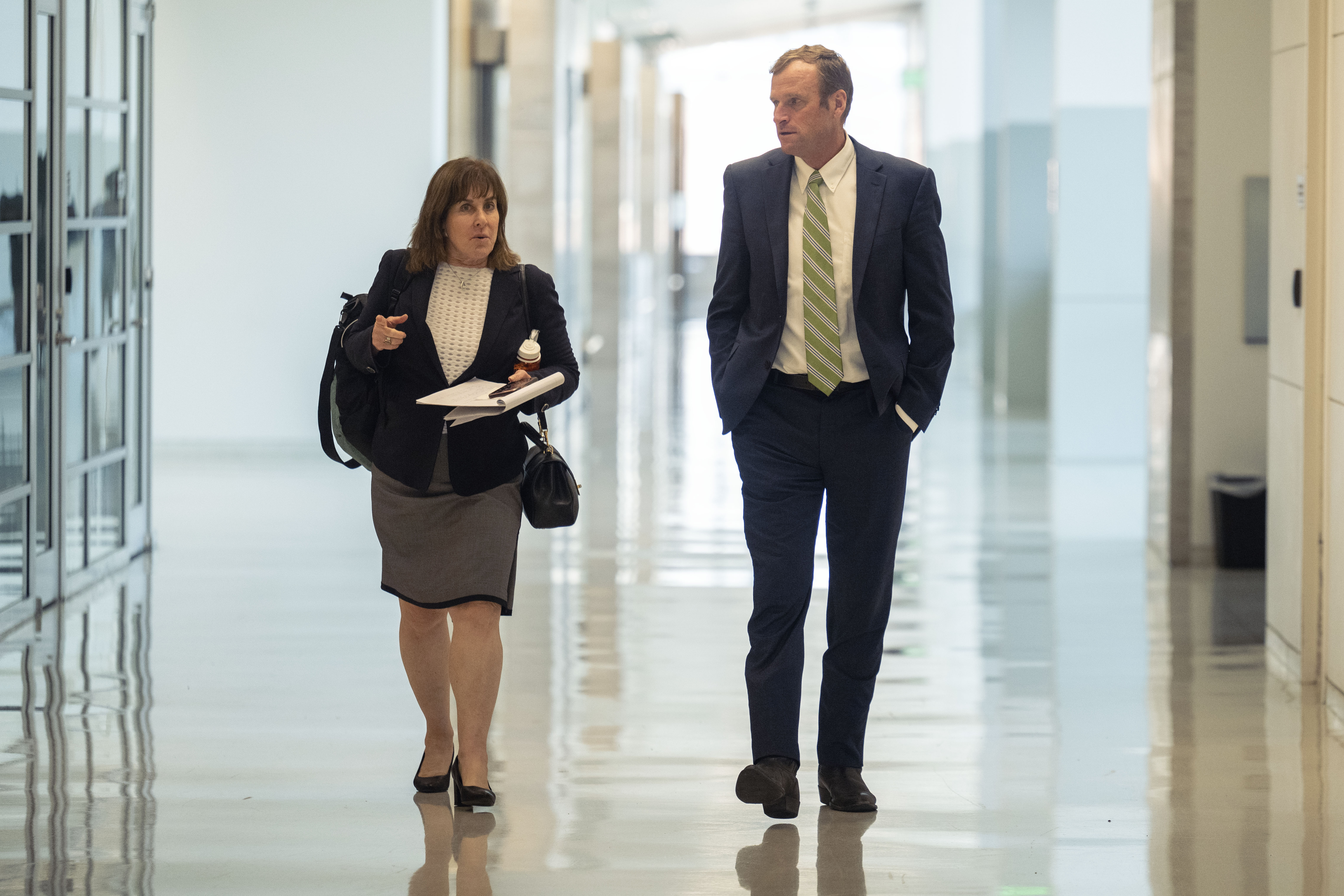Attorney Nancy Cohen, left, and 11th Judicial Deputy District Attorney Mark Hurlbert walk to the courtroom after a lunch break during Linda Stanley's disciplinary hearing on Tuesday, June 11, 2024. (Stephen Swofford, Denver Gazette) (StephenSwoffordPhotographerstephen.swofford@gazette.comhttps://secure.gravatar.com/avatar/1ddcaf11c5d70eaa58546ddc4e038687?d=mm&r=g)