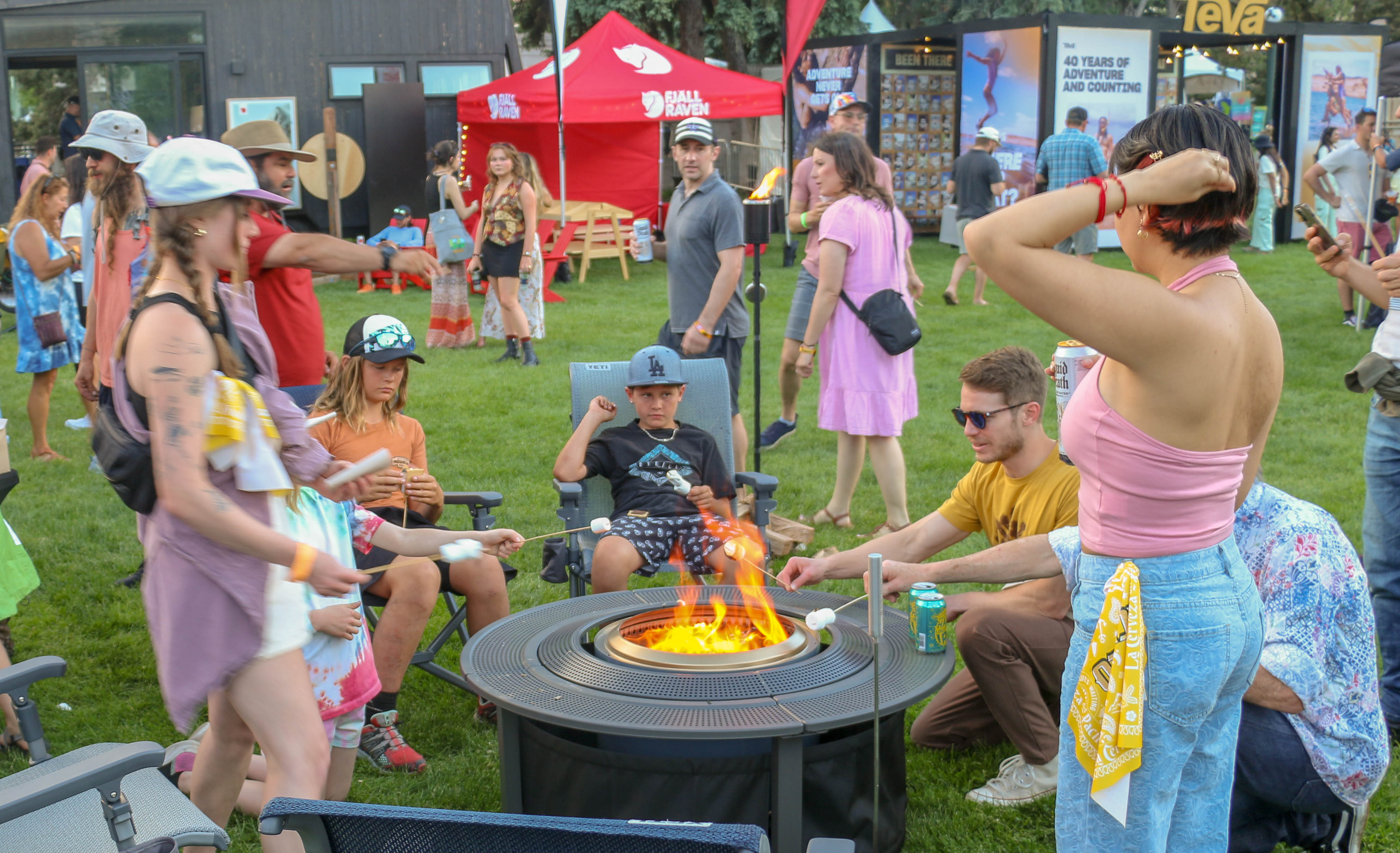 Yes, outdoor enthusiasts roasted marshmallows in the 90-degree heat of the inaugural Outside Festival in Civic Center Park on Saturday, June 1, 2024. (John Moore, The Denver Gazette) (John Moore)