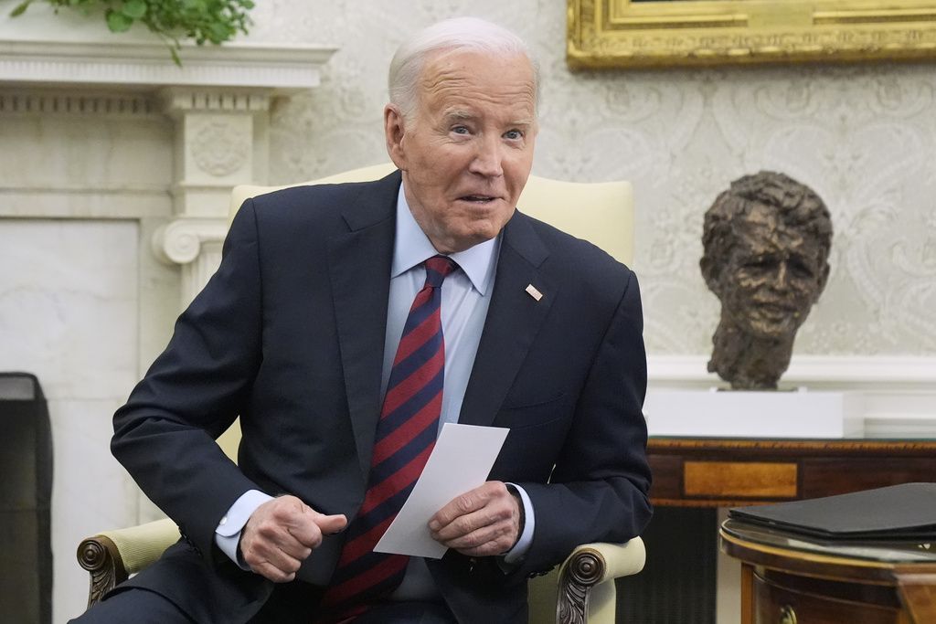 Biden unveils plan to protect immigrants married to US citizens from deportation and expands work permits