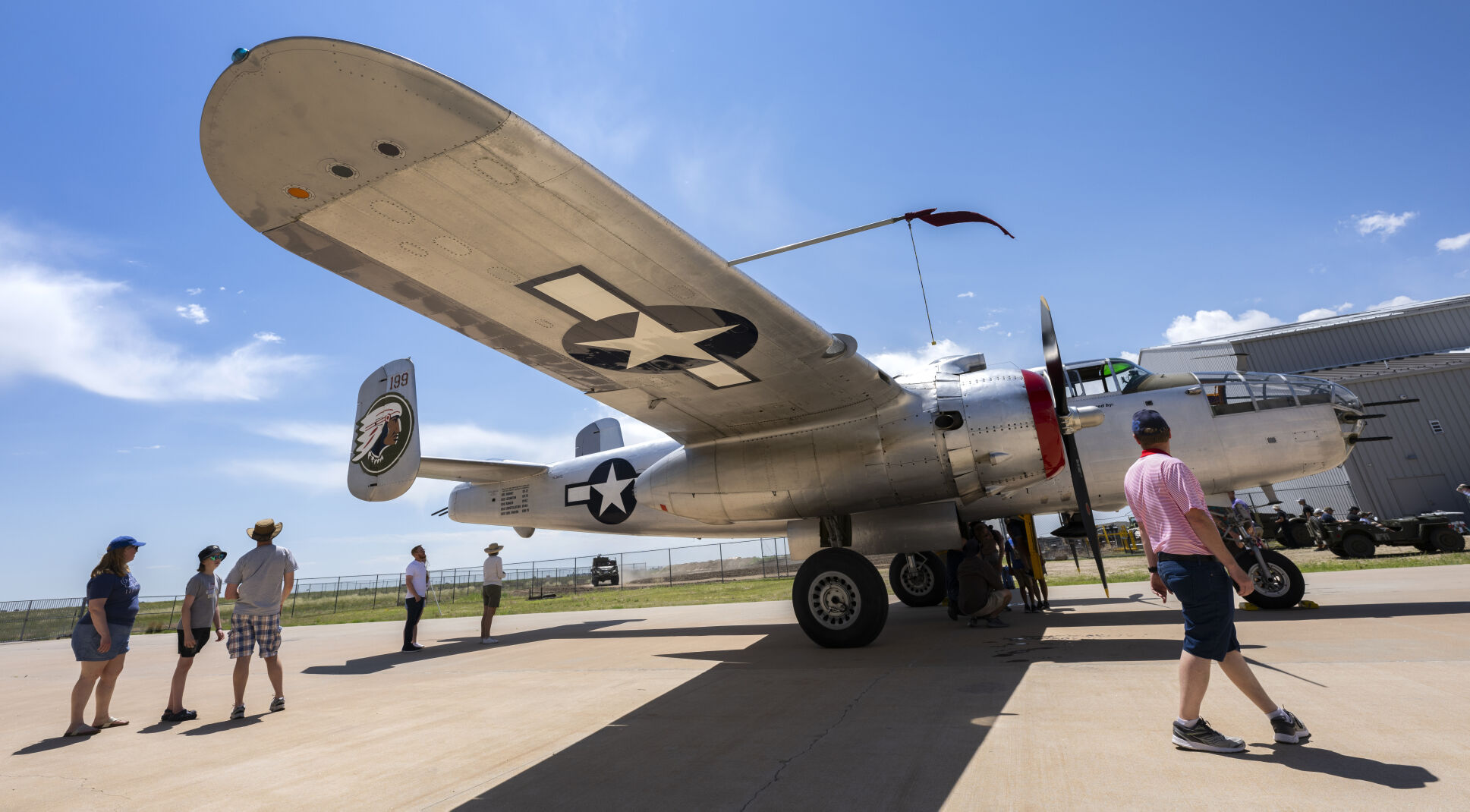 Visitors walk around the North American B-25 Mitchell on display at the National Museum of World War II Aviation last year at the Colorado Springs Airport. (Christian Murdock, the gazette)