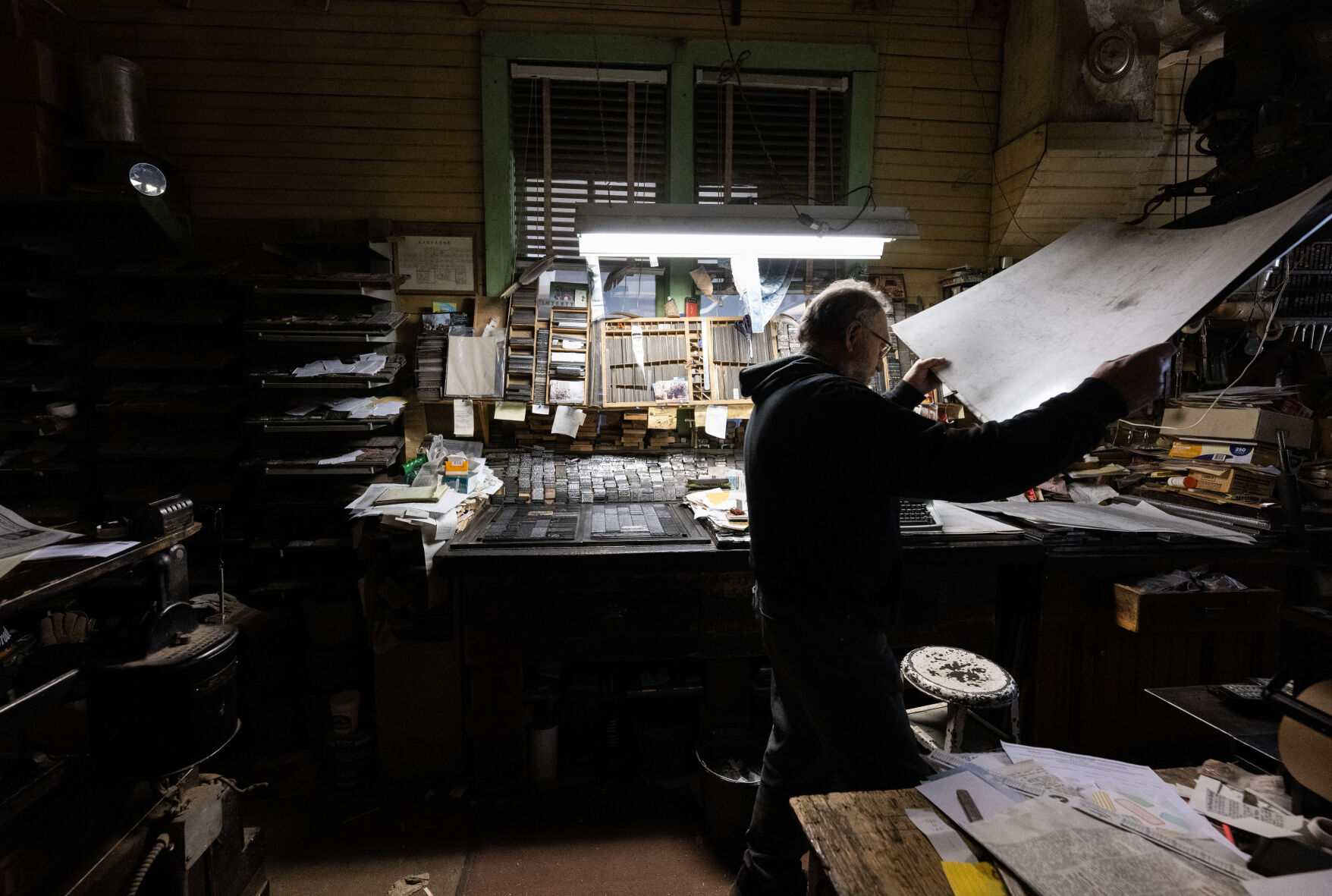 Dean Coombs, 72, works in the 1870s building of the Saguache Crescent newspaper Thursday, May 8, 2024. His family has owned the paper since 1917. The paper is believed to be the last linotype-made newspaper in the country and possibly the world. (The Gazette, Christian Murdock) (Christian Murdock/The Gazette)