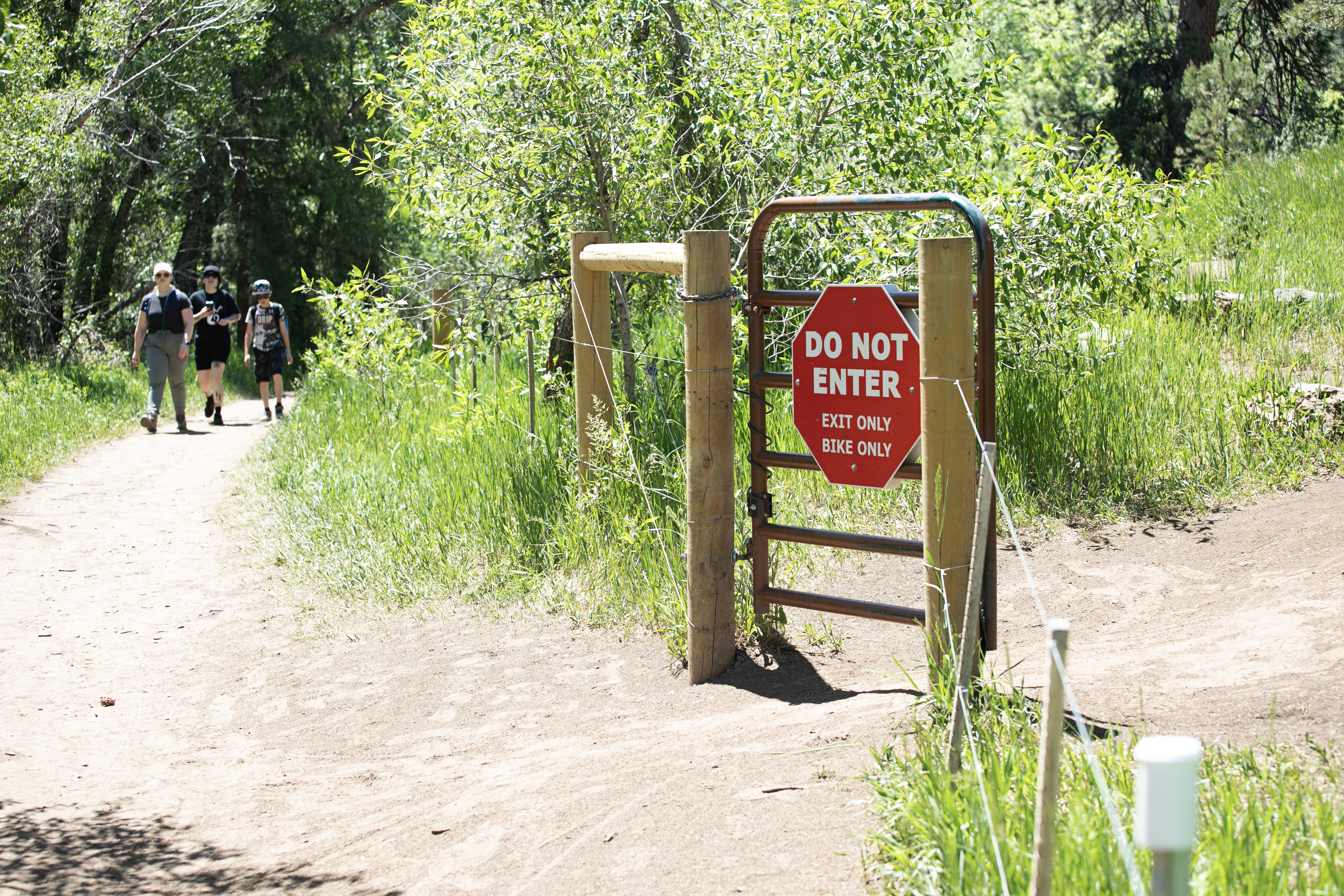Hikers walk past the exit to Rutabaga Ride in Lair o' the Bear Park on Tuesday, June 11, 2024. (TomHellauerMultimedia Producertom.hellauer@denvergazette.comhttps://denvergazette.com/content/tncms/avatars/f/9e/622/f9e6228a-3b6b-11ed-bf10-fbb71fa8e421.f54b911252c540f1d61709edc4727a39.png)