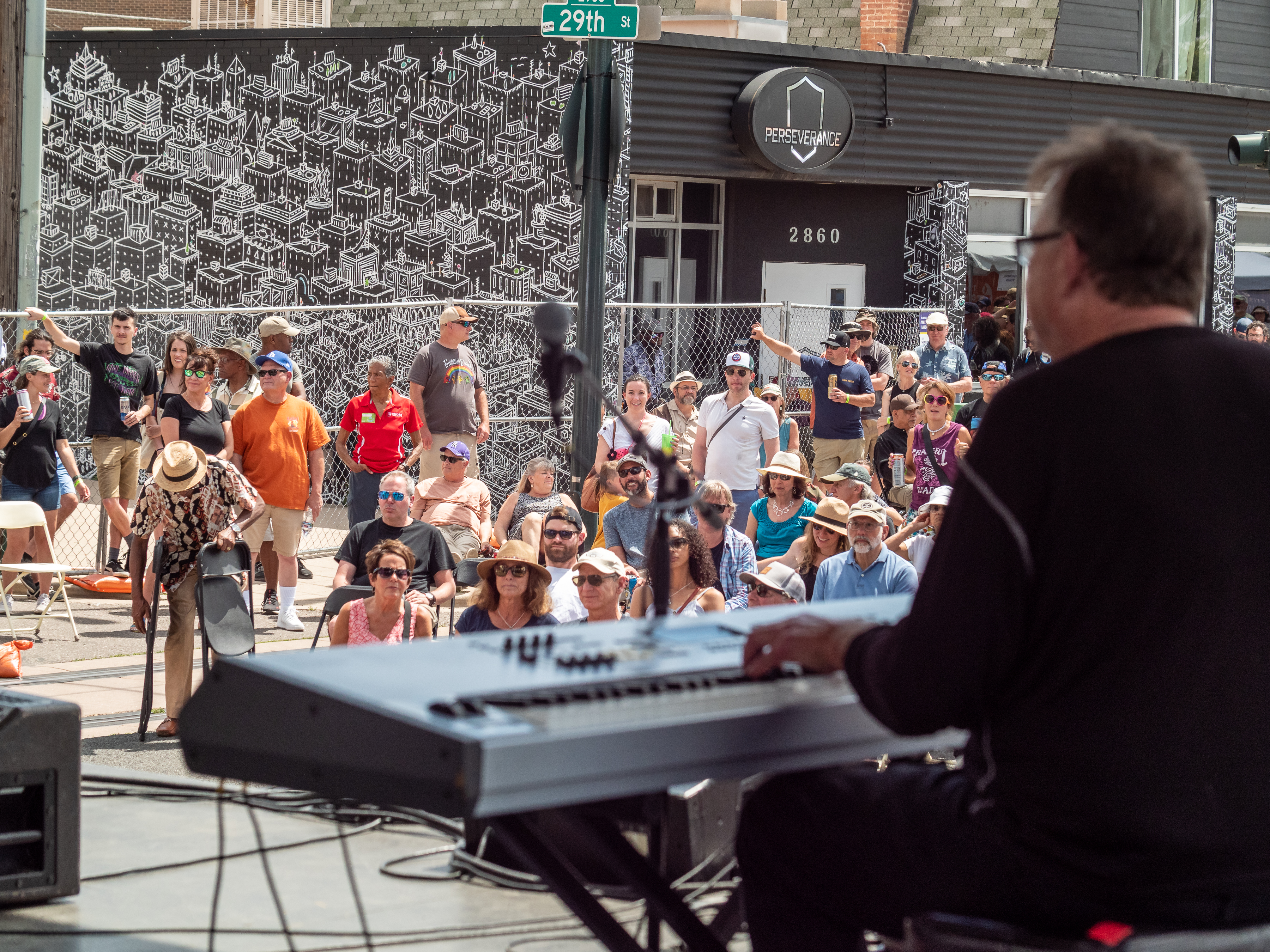 Crowds enjoy the Rob Mullins Band at the Five Points Jazz Festival and Parade on Welton Street in downtown Denver, Colo. Saturday, Jun 4, 2022. This year's event takes place Saturday. (Liz Copan/Special to The Denver Gazette)