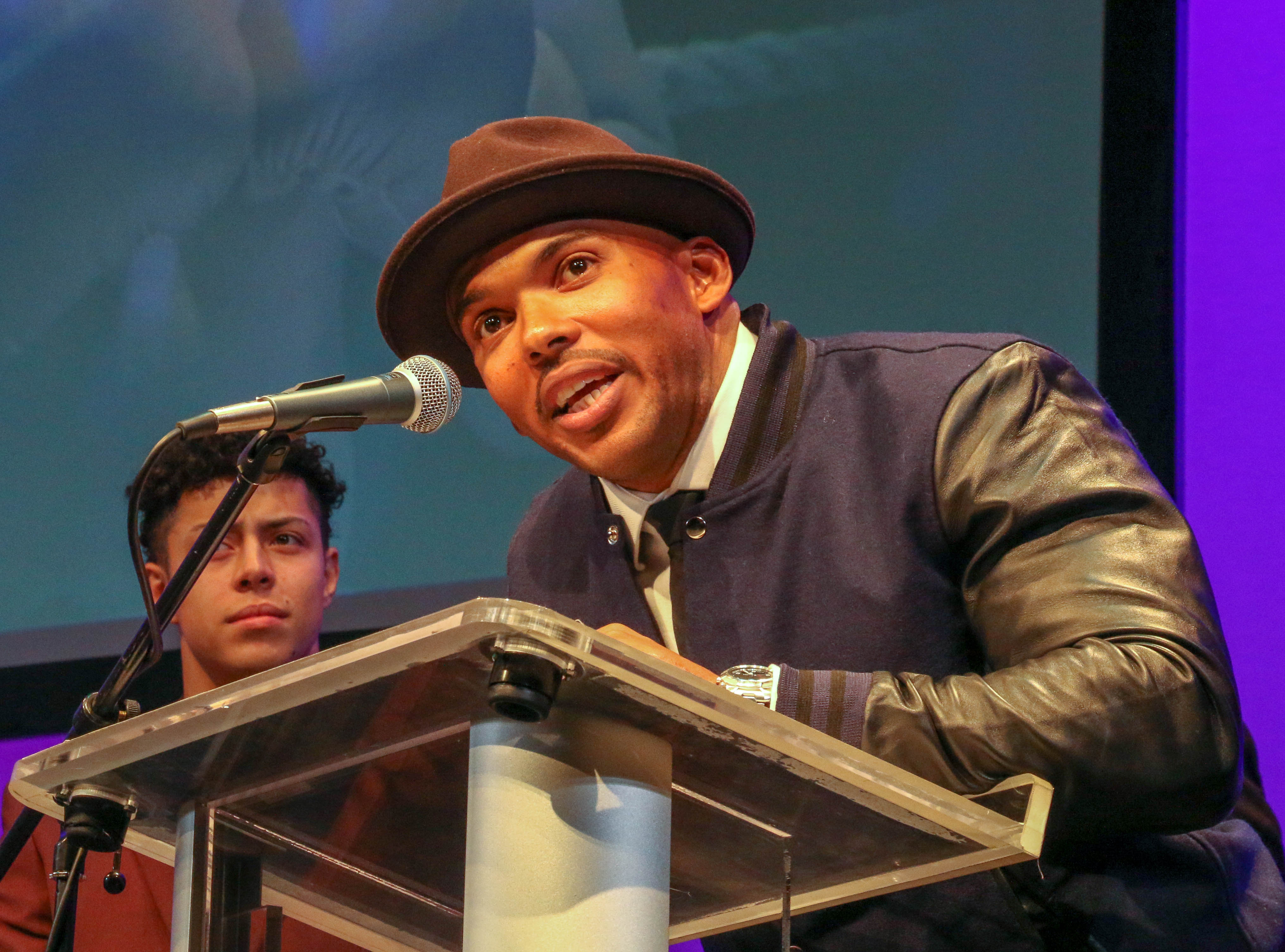 Lavour Addison accepts the Henry Award for Outstanding Actor in a Play for his performance in the Bolder Ensemble Theatre Company's