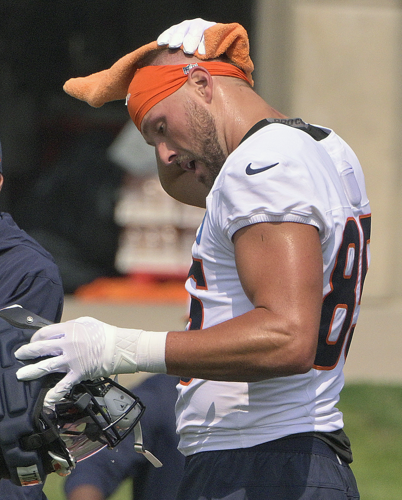 Broncos wide receiver Lucas Kroll tries to cool off during practice at the Denver Broncos training center on Wednesday, July 24, 2024. (Jerilee Bennett The Gazette)