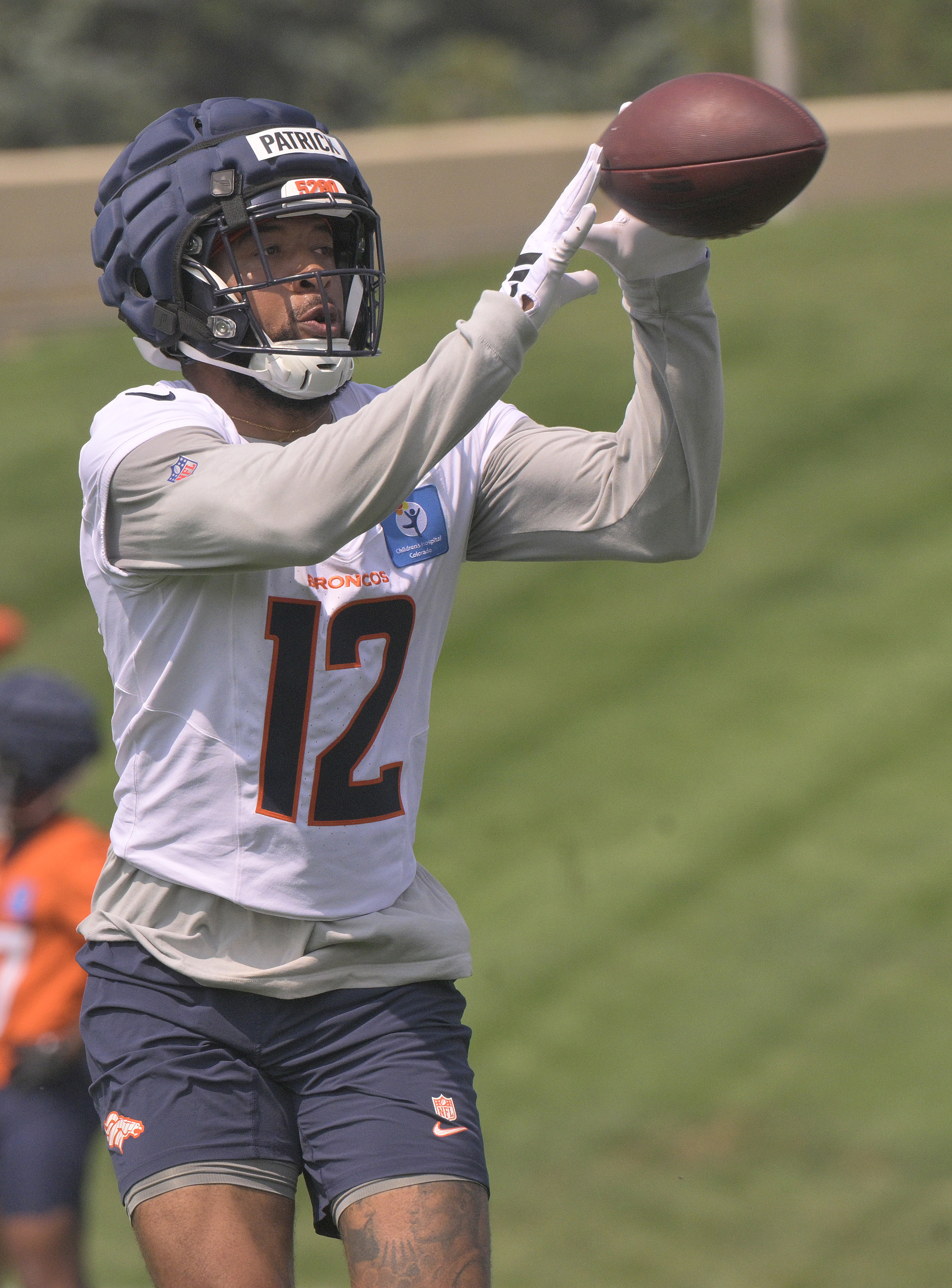 Broncos wide receiver Tim Patrick catches the ball during practice at the Denver Broncos training center on Wednesday, July 24, 2024. (Jerilee Bennett The Gazette)