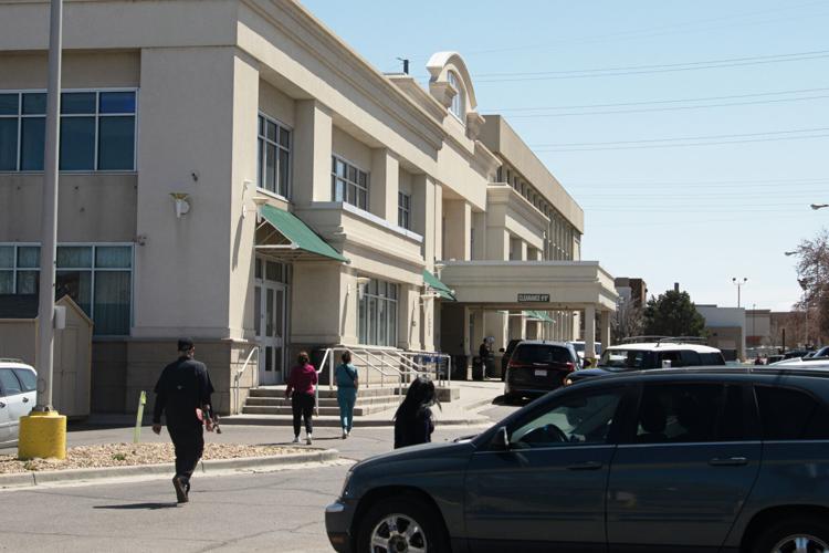 Residents and staff walk into the shelter (copy)