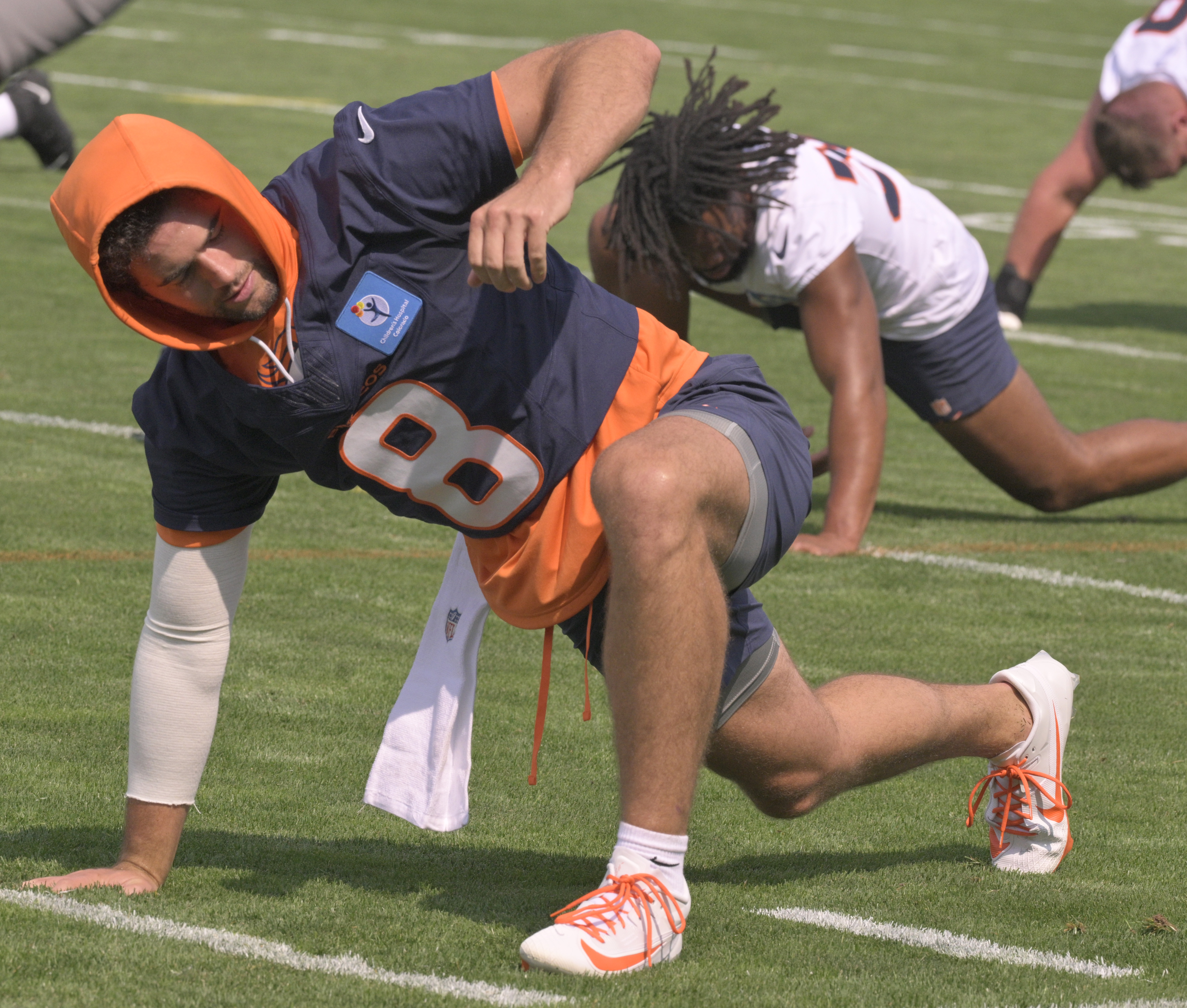 Broncos quarterback Jarrett Stidham stretches during practice at the Denver Broncos training center on Wednesday, July 24, 2024. (Jerilee Bennett The Gazette)