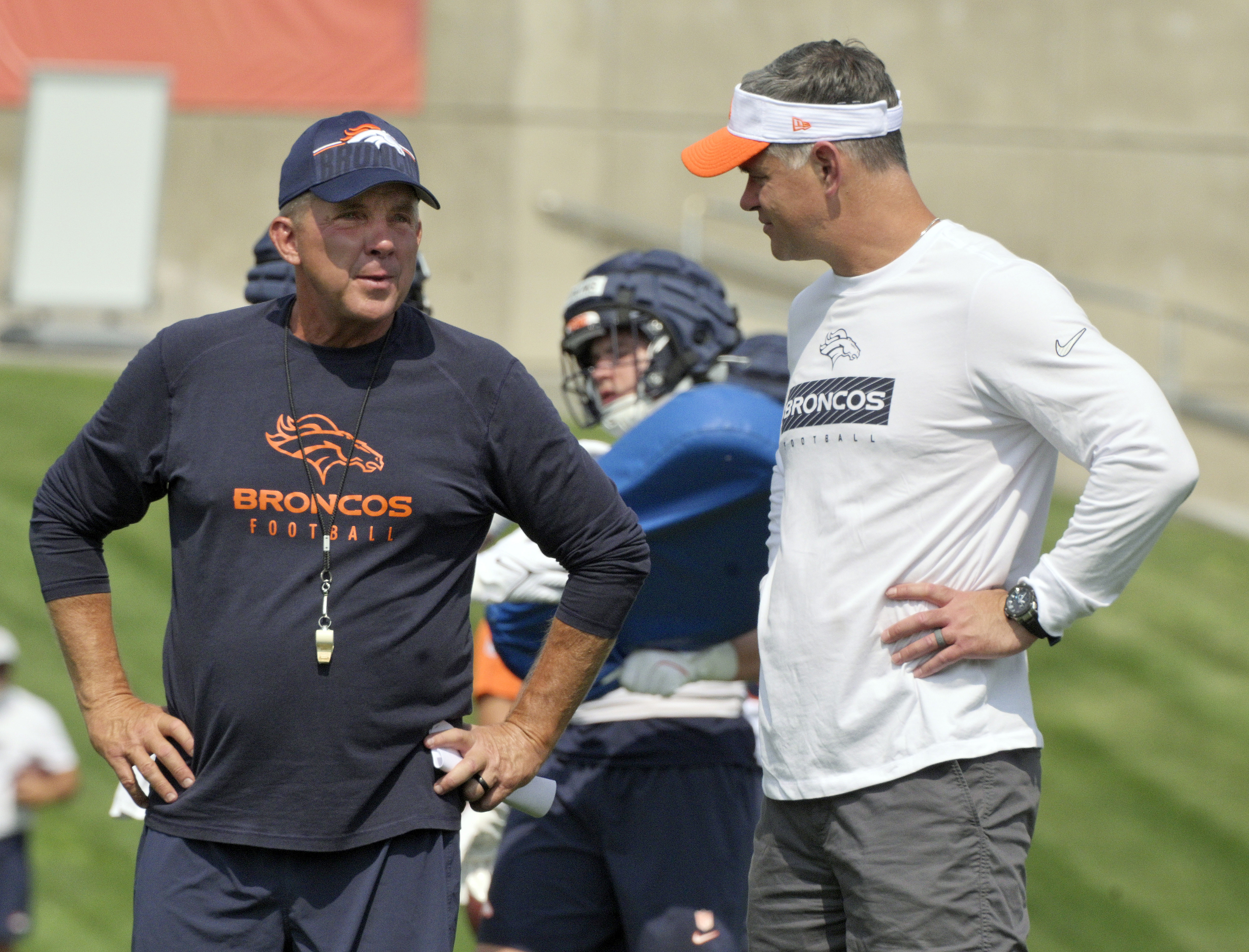 Broncos head coach Sean Payton chats with offensive coordinator Joe Lombardi during practice at the Denver Broncos training center on Wednesday, July 24, 2024. (Jerilee Bennett, The Gazette)