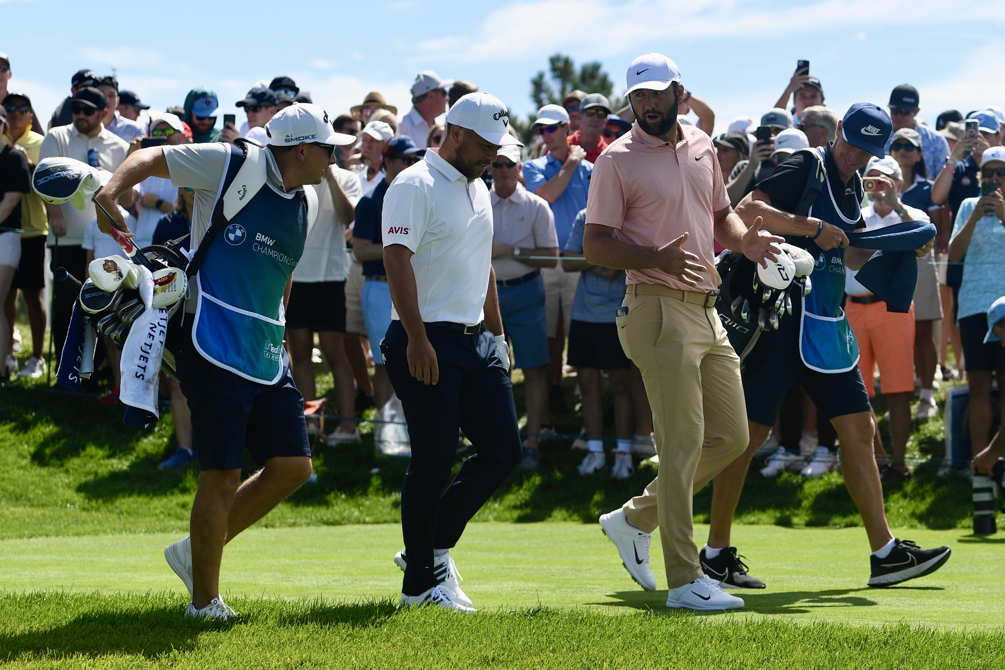 Scottie Scheffler and Xander Schauffele talk with each other at Castle Pines Golf Club during the second round of the BMW Championship on Friday, Aug. 23, 2024. (CarsonFieldcarson.field@gazette.comhttps://secure.gravatar.com/avatar/c524ef3d384945349bed78d70eb2d2cd?d=mm&r=g)