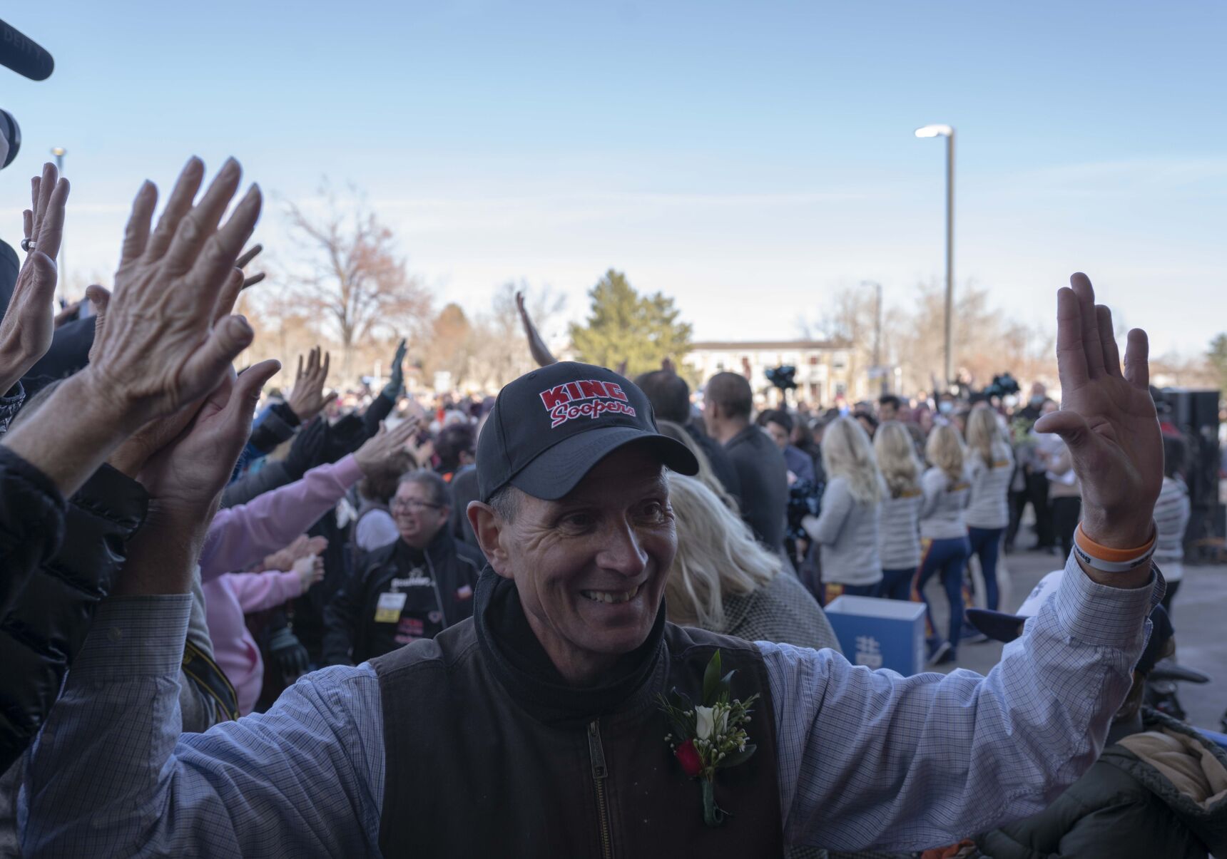 FILE PHOTO: Crowds greet and applaud Table Mesa King Soopers employees as they make their way into the store on Wednesday, Feb. 9, 2022, in Boulder, Colo. The King Soopers staff had not been to work since March of 2021 when the store was closed indefinitely after the shooting. Many of the employees were in the grocery store that snowy day in March when a gunman opened fire on shoppers and staff. (Armond Feffer/Special to The Denver Gazette) (Armond Feffer/Special to The Denver Gazette)