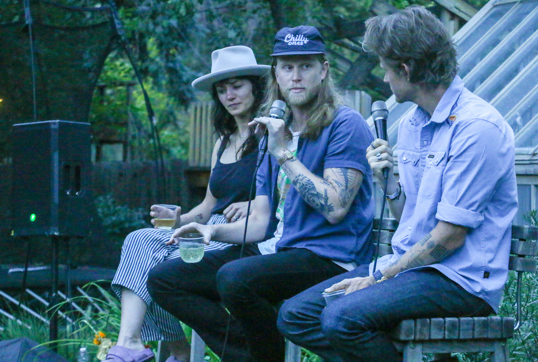 Brandy and Wesley Schultz, left,invited friends to gather in their backyard for a garden party and book launch for friend Cory Richards' book