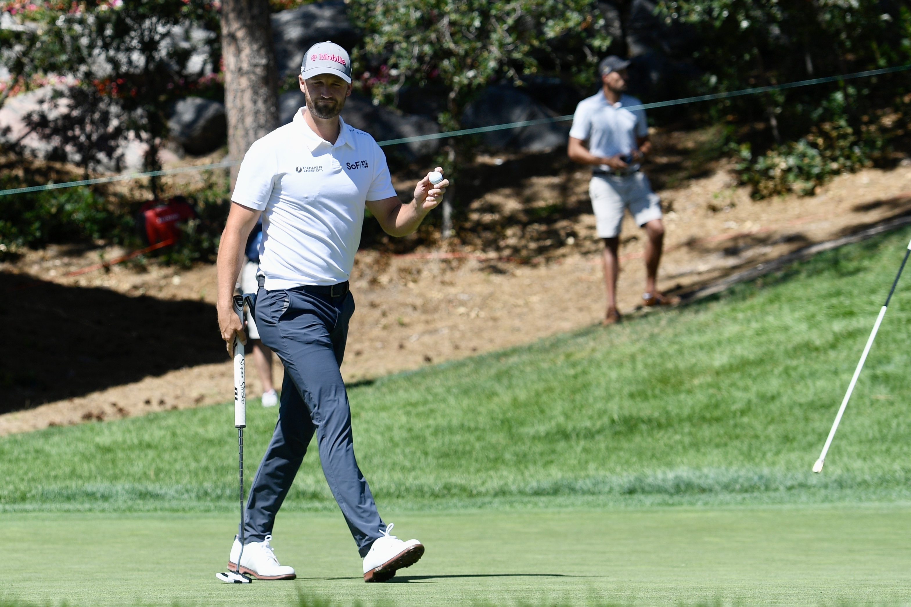Wyndham Clark salutes the crowd after making a birdie at Castle Pines Golf Club during the first round of the BMW Championship on Thursday, Aug. 22, 2024. (CarsonFieldcarson.field@gazette.comhttps://secure.gravatar.com/avatar/c524ef3d384945349bed78d70eb2d2cd?d=mm&r=g)
