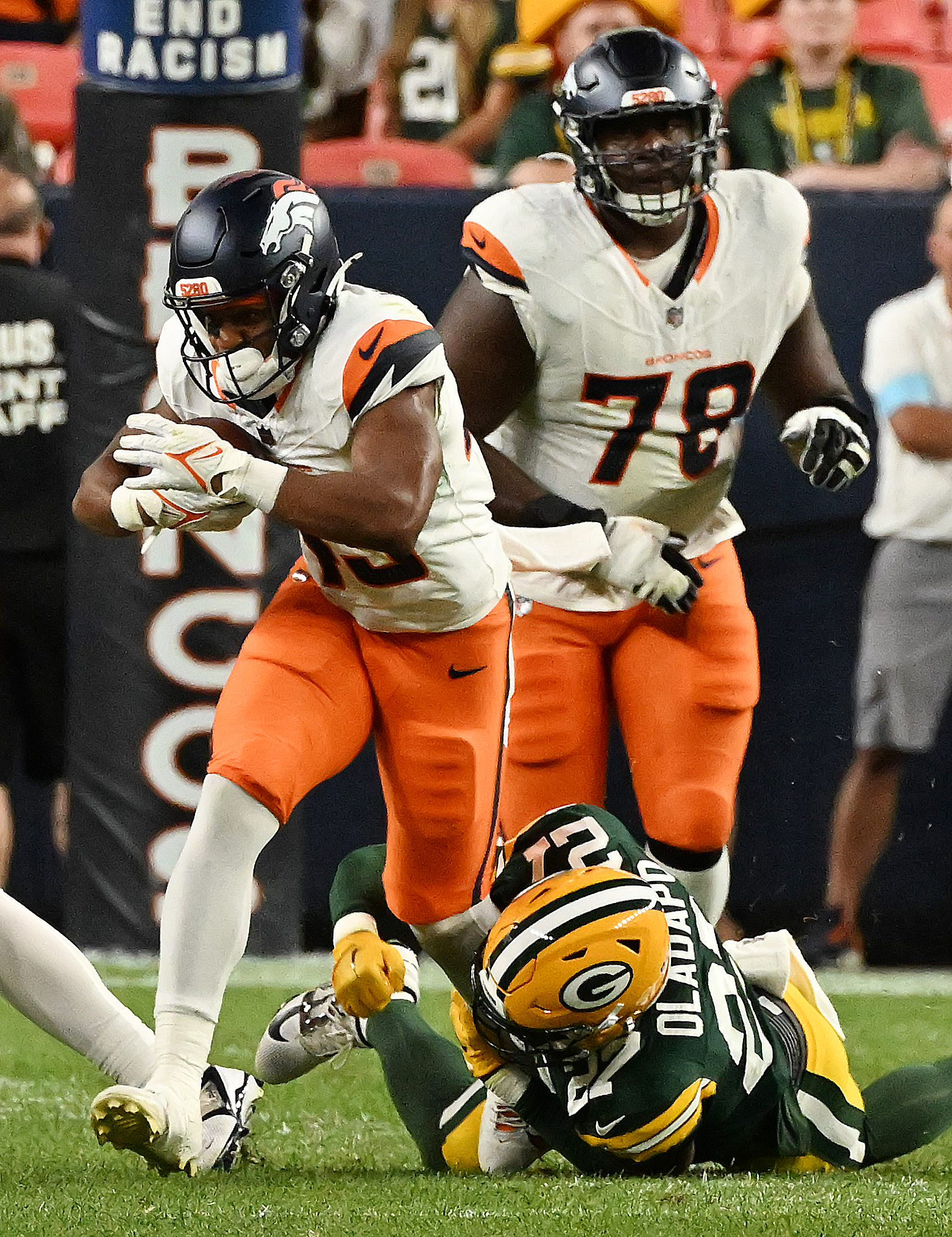 Broncos running back Blake Watson carries the ball during the fourth quarter a preseason game against the Packers on Sunday, Aug. 18, 2024. The Broncos won the game 28-2. (Jerilee Bennett The Gazette)