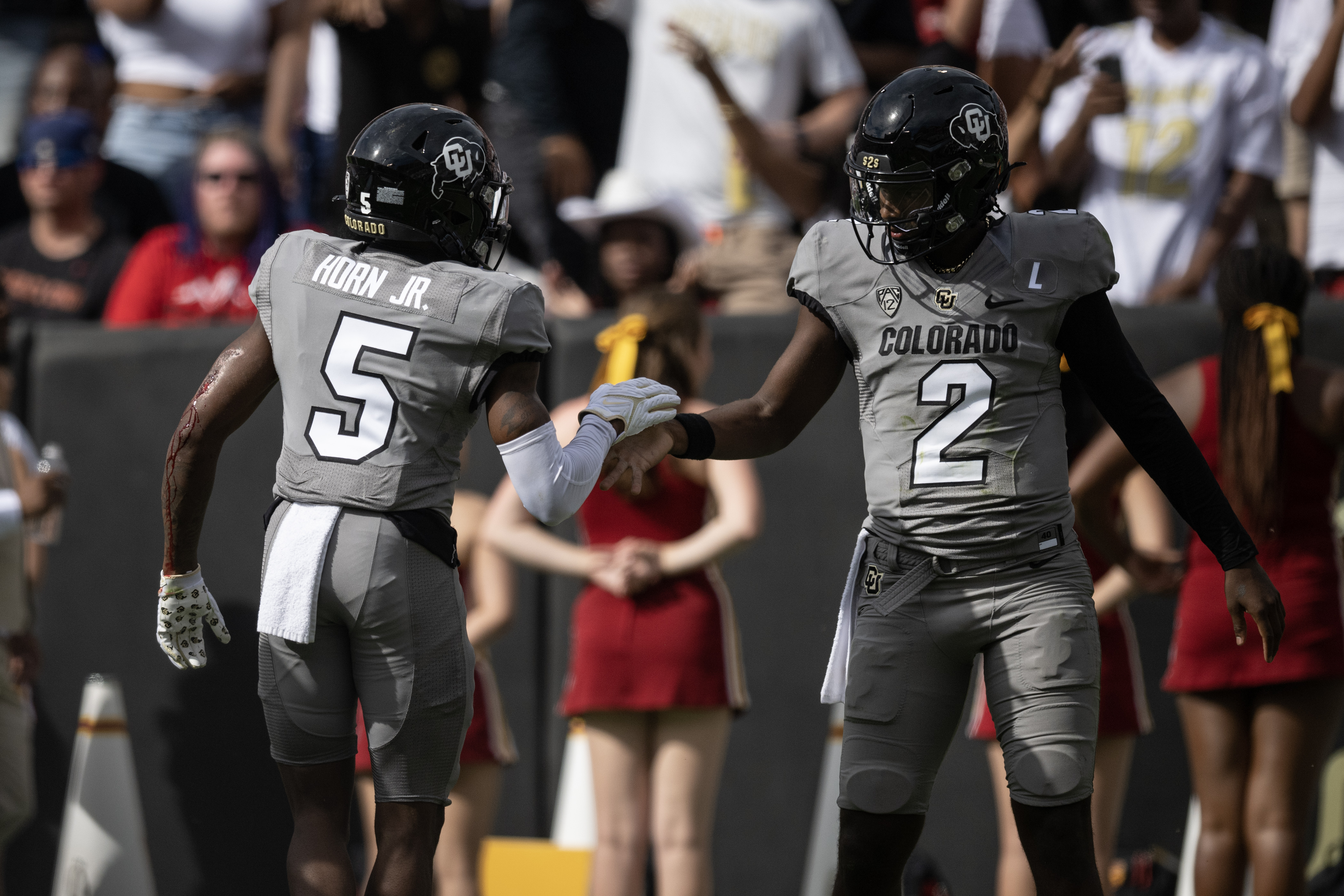 Colorado Buffaloes quarterback Shedeur Sanders (2) celebrates a touchdown reception by Colorado Buffaloes wide receiver Jimmy Horn Jr. (5) during the second half against the USC Trojans on Saturday, Sept. 30, 2023, at Folsom Field in Boulder, Colo. (Timothy Hurst/Denver Gazette) (TimHursttim.hurst@gazette.comhttps://secure.gravatar.com/avatar/aca82bd62b4ee425c598527cd6faa1b1?d=mm&r=g)