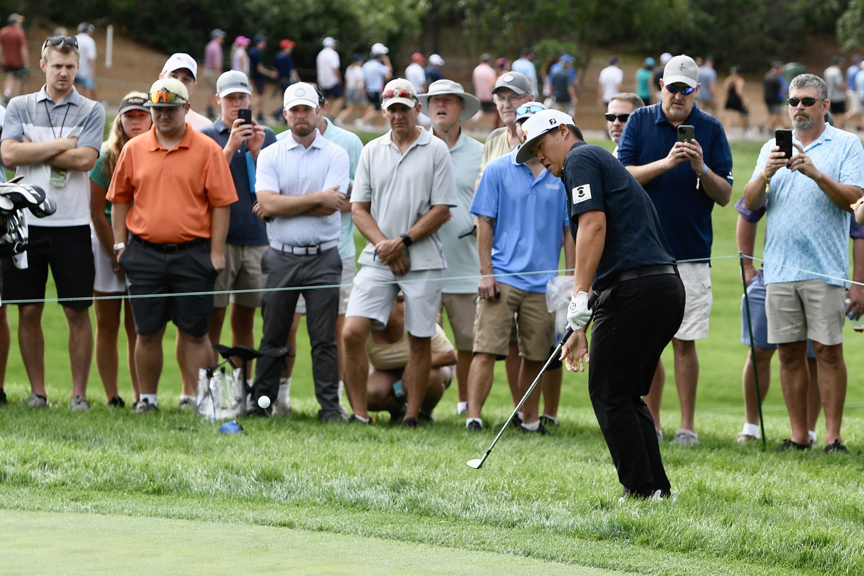 Sungjae Im chips at Castle Pines Golf Club during the first round of the BMW Championship on Thursday, Aug. 22, 2024. (CarsonFieldcarson.field@gazette.comhttps://secure.gravatar.com/avatar/c524ef3d384945349bed78d70eb2d2cd?d=mm&r=g)