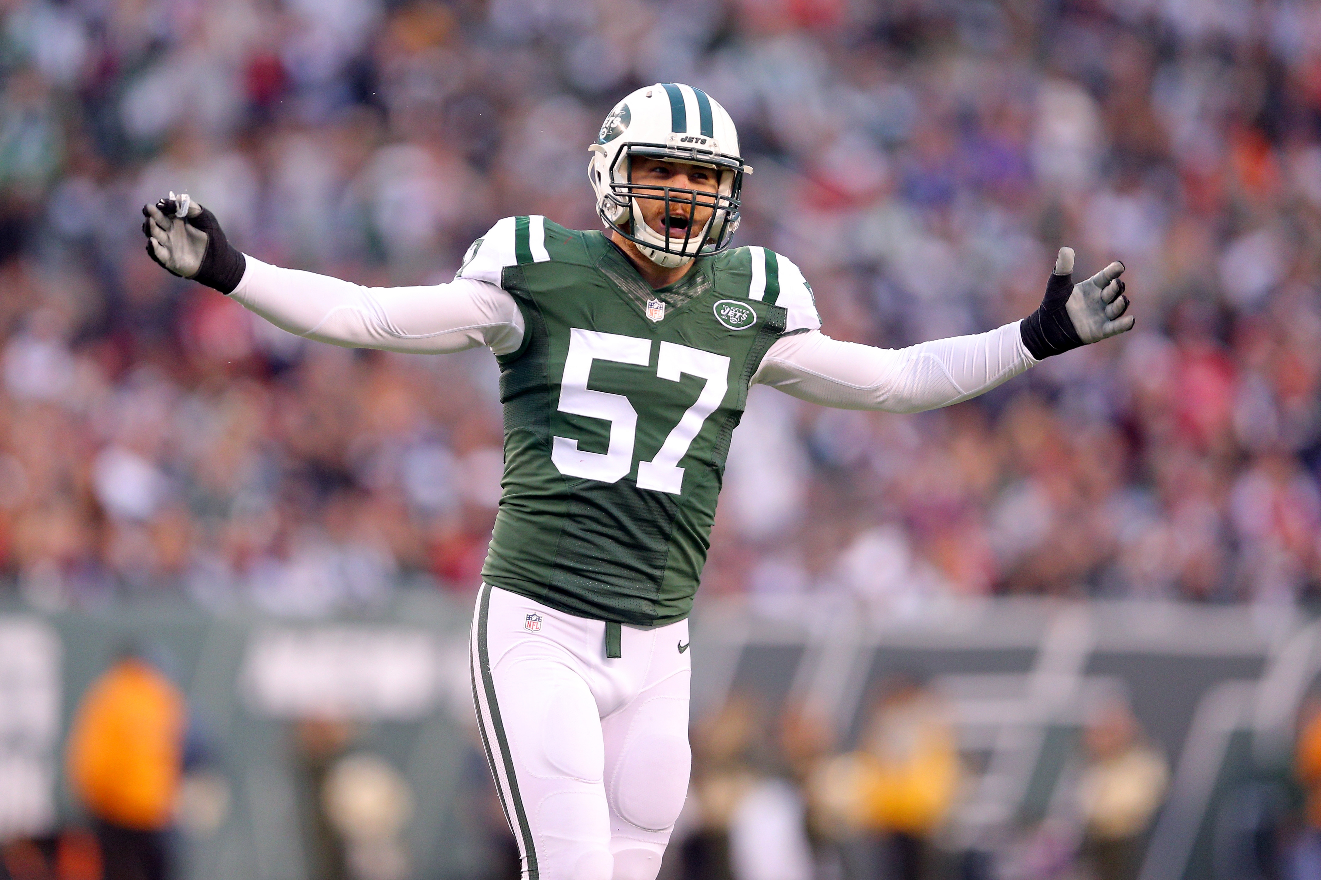 New York Jets linebacker Trevor Reilly (57) reacts against the New England Patriots during an NFL game at MetLife Stadium in East Rutherford, N.J. on Sunday, Dec. 27, 2015. (AP Photo/Brad Penner) (Brad Penner)
