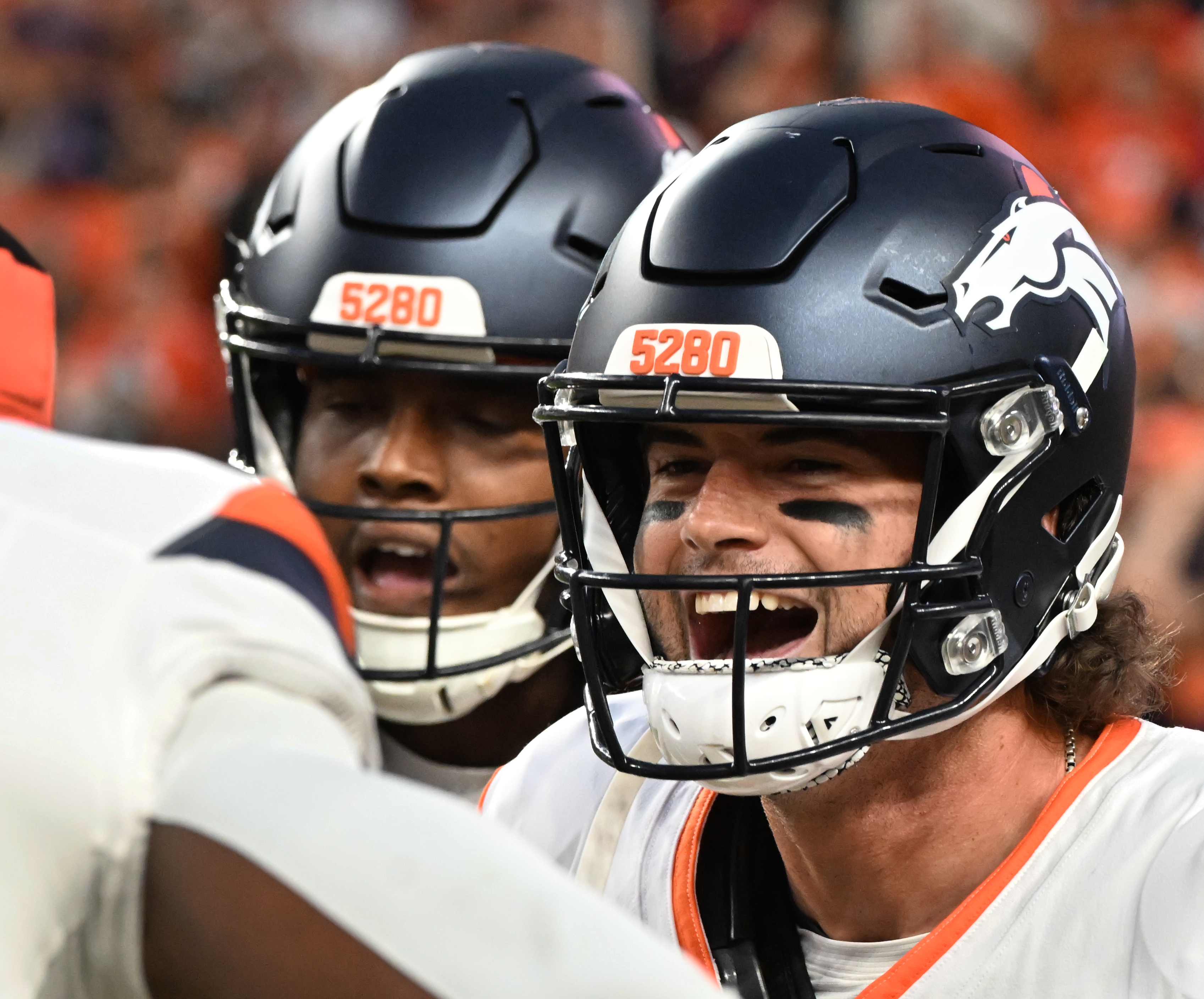 Denver Broncos quarterback Jarrett Stidham (8) after scoring a touchdown during a preseason game against the Packers on Sunday, Aug. 18, 2024. The Broncos won the game 27-2. (Jerilee Bennett, The Gazette)