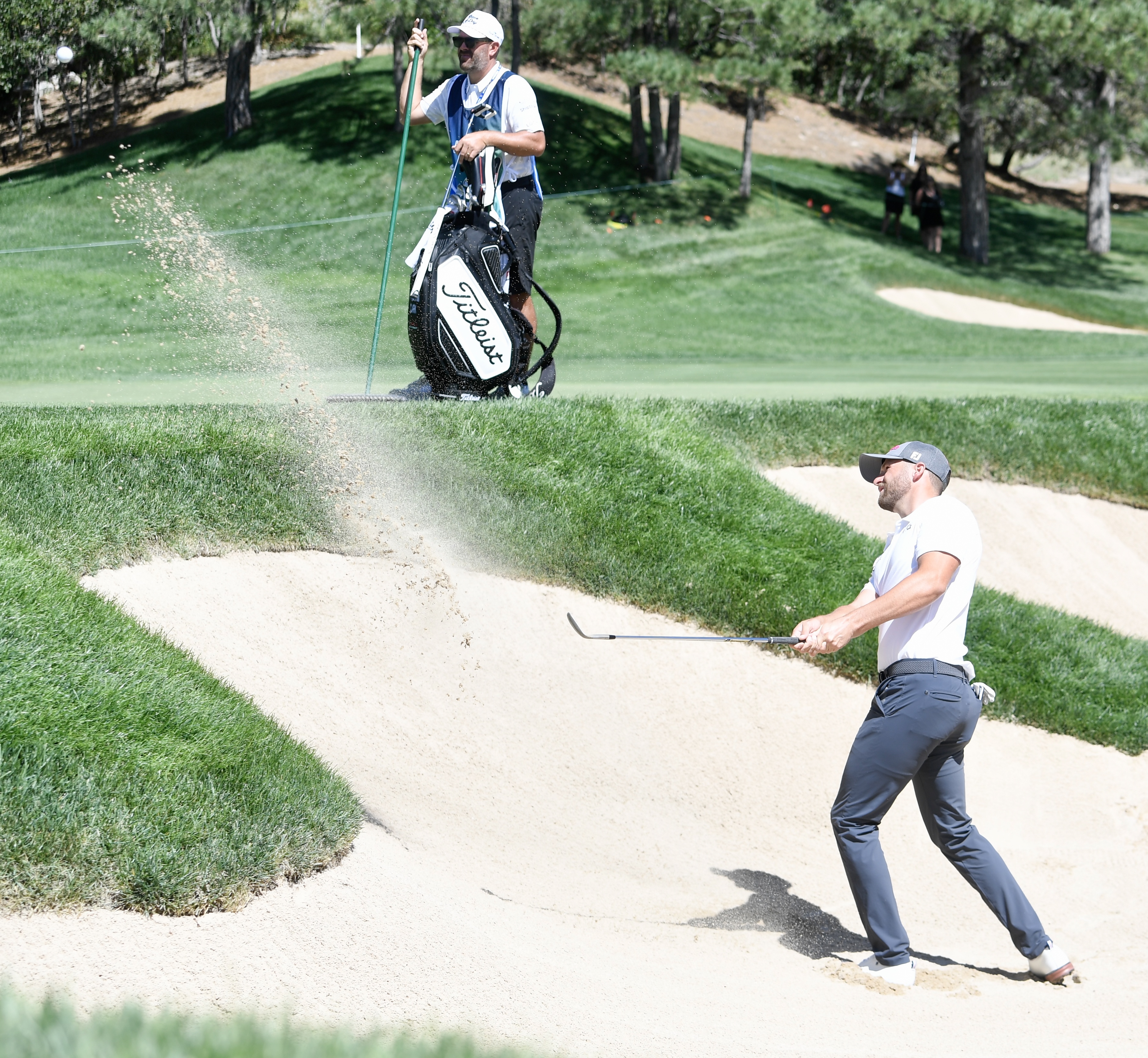 Wyndham Clark hits from the sand at Castle Pines Golf Club during the first round of the BMW Championship on Thursday, Aug. 22, 2024. (Carson Field, The Gazette) (CarsonFieldcarson.field@gazette.comhttps://secure.gravatar.com/avatar/c524ef3d384945349bed78d70eb2d2cd?d=mm&r=g)