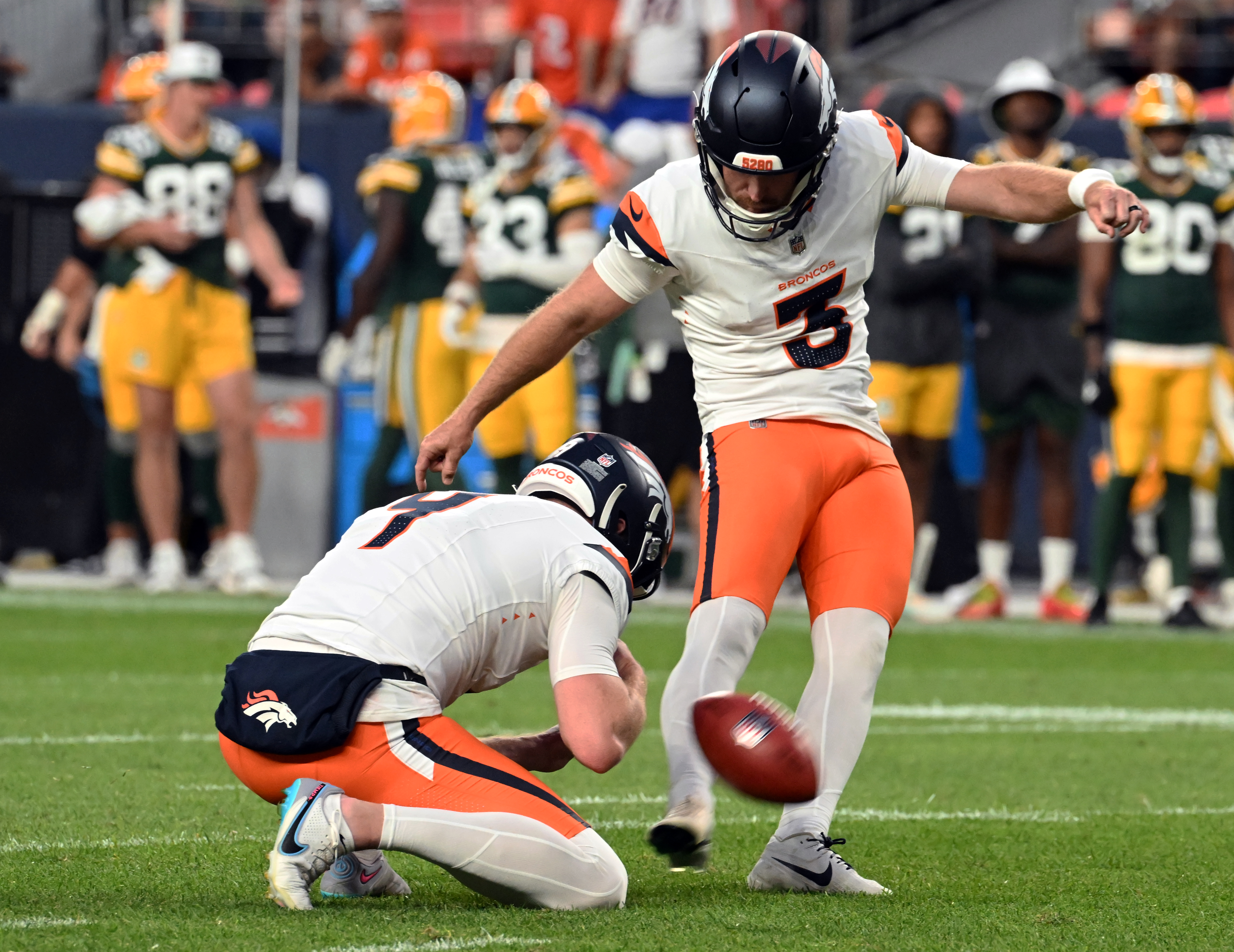 Broncos kicker Will Lutz kicks an extra point during a preseason game against the Packers on Sunday, Aug. 18, 2024. The Broncos won the game 27-2. (Jerilee Bennett, The Gazette)