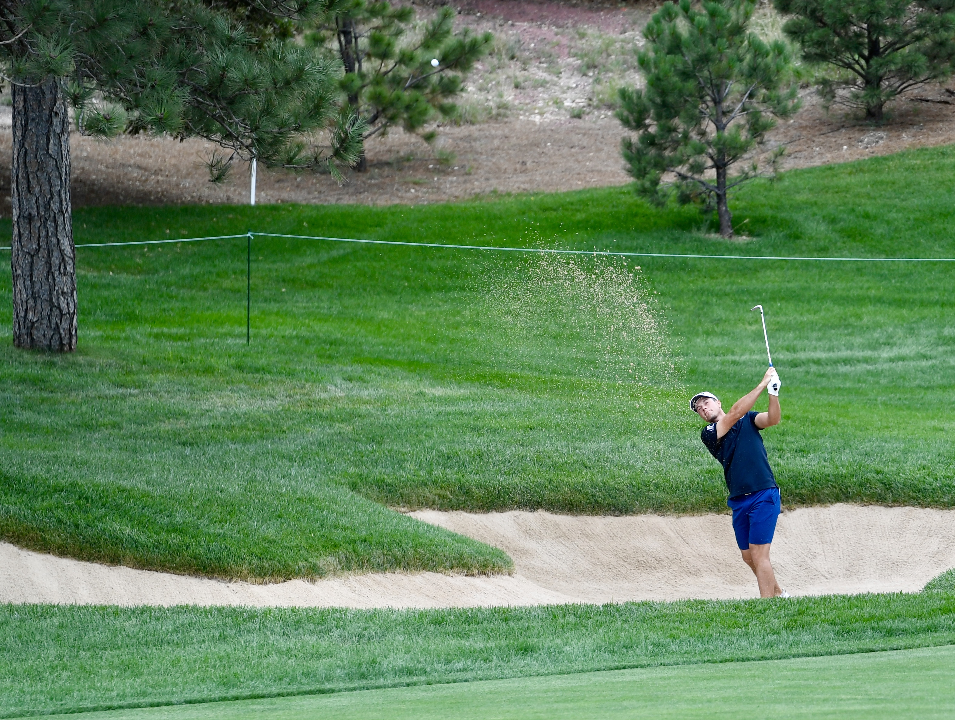 Viktor Hovland hits out of the sand at Castle Pines Golf Club at Wednesday's BMW Championship pro-am on Aug. 21, 2024. (Carson Field, The Gazette) (CarsonFieldcarson.field@gazette.comhttps://secure.gravatar.com/avatar/c524ef3d384945349bed78d70eb2d2cd?d=mm&r=g)