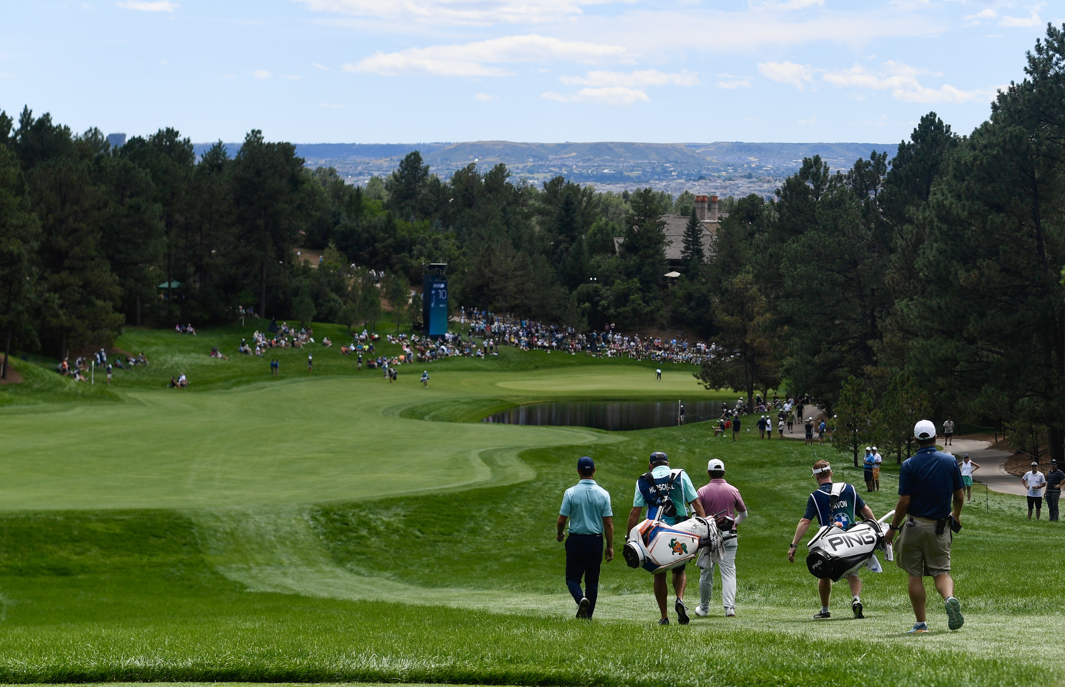 The pairing of Billy Horschel and Matthieu Pavon walk down the fairway on hole 10 at Castle Pines Golf Club during the second round of the BMW Championship on Friday, Aug. 23, 2024. (CarsonFieldcarson.field@gazette.comhttps://secure.gravatar.com/avatar/c524ef3d384945349bed78d70eb2d2cd?d=mm&r=g)