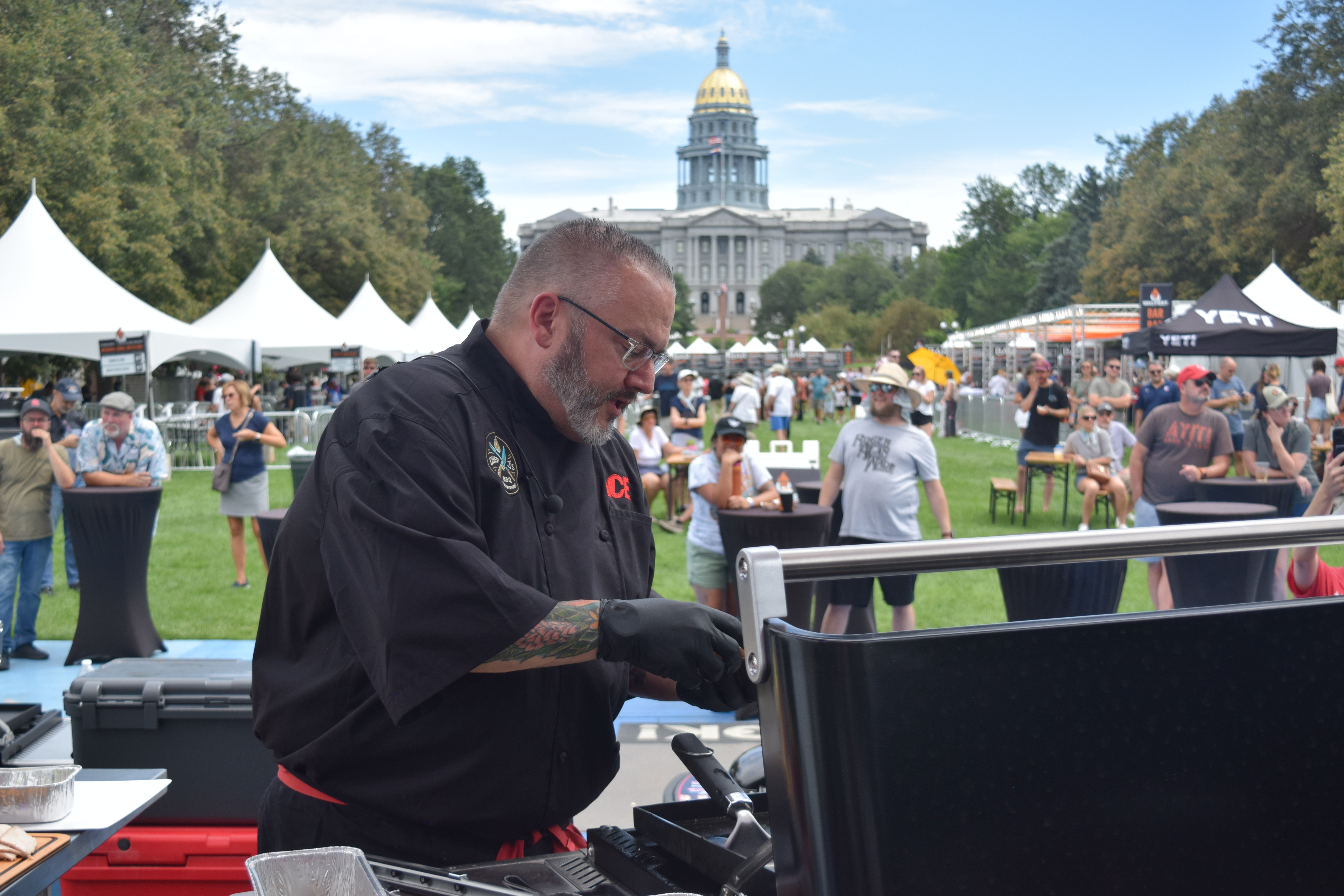 Jason Morse, national spokesperson for Ace Hardware based in Colorado, shows the crowd at Q BBQ Fest on Saturday how to cook Kentucky Hot Brown sandwiches using turkey, one of the cooking showcases held at the two-day festival. (SageKelleyJefferson County Reportersage.kelley@denvergazette.comhttps://denvergazette.com/content/tncms/avatars/e/5f/457/e5f45740-2717-11ee-85b2-ab80f2d36252.5b966c1d2ce4987987665d57c237eda4.png)