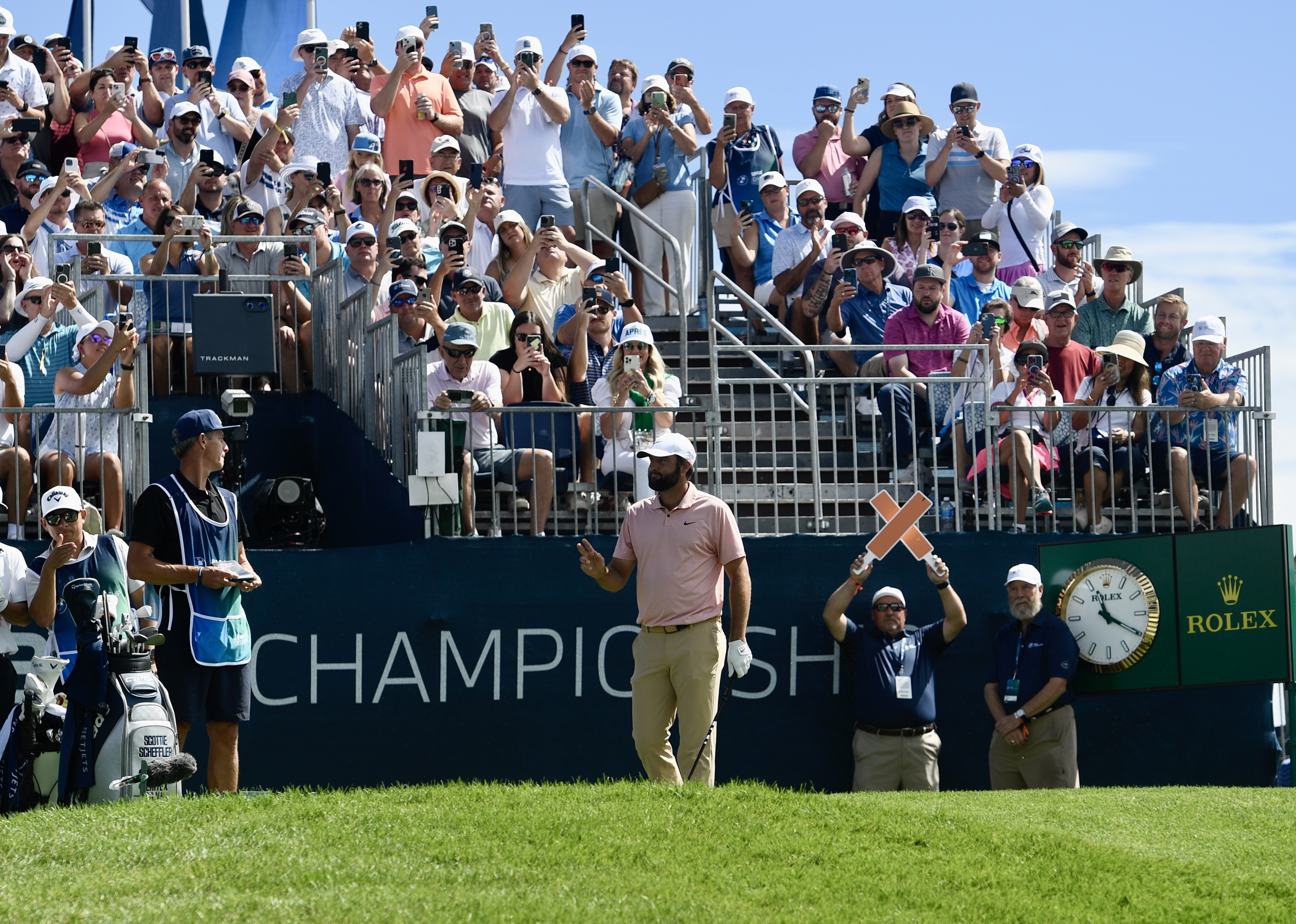 Scottie Scheffler salutes the crowd at Castle Pines Golf Club during the second round of the BMW Championship on Friday, Aug. 23, 2024. (CarsonFieldcarson.field@gazette.comhttps://secure.gravatar.com/avatar/c524ef3d384945349bed78d70eb2d2cd?d=mm&r=g)