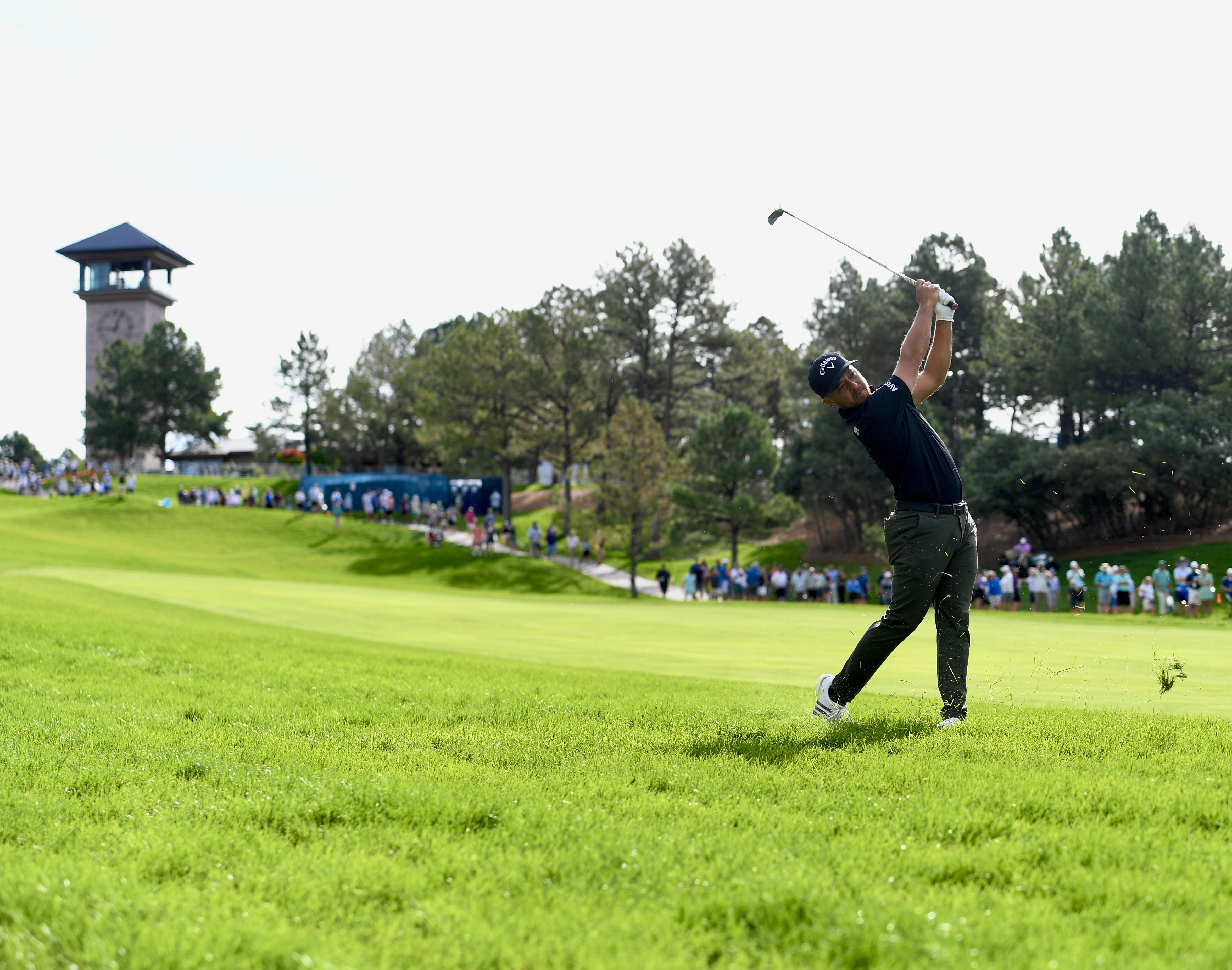 Xander Schauffele hits from the rough at Castle Pines Golf Club during the first round of the BMW Championship on Thursday, Aug. 22, 2024. (CarsonFieldcarson.field@gazette.comhttps://secure.gravatar.com/avatar/c524ef3d384945349bed78d70eb2d2cd?d=mm&r=g)