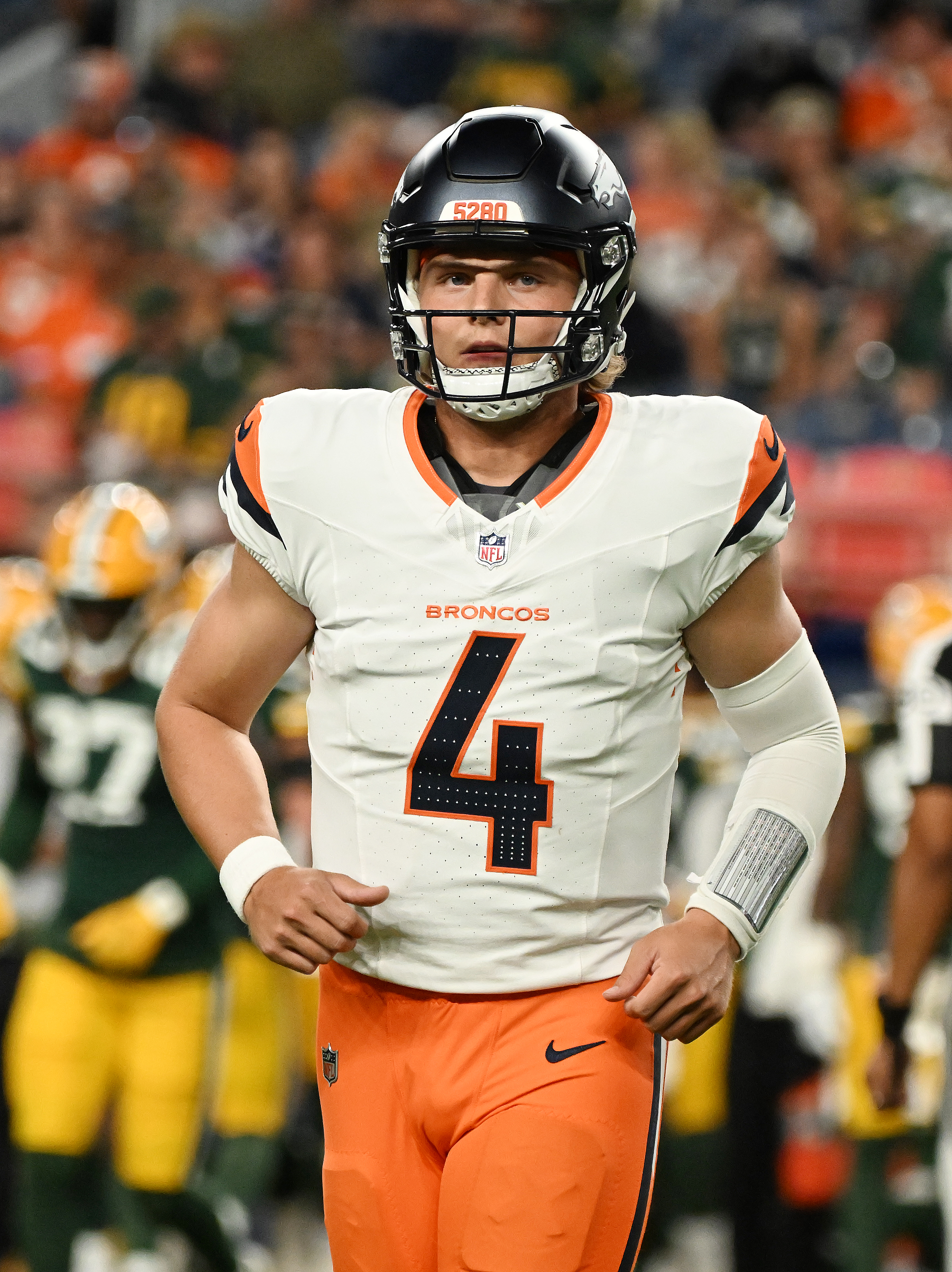 Broncos quarterback Zach Wilson heads off the field during the fourth quarter a preseason game against the Packers on Sunday, Aug. 18, 2024. The Broncos won the game 28-2. (Jerilee Bennett The Gazette)