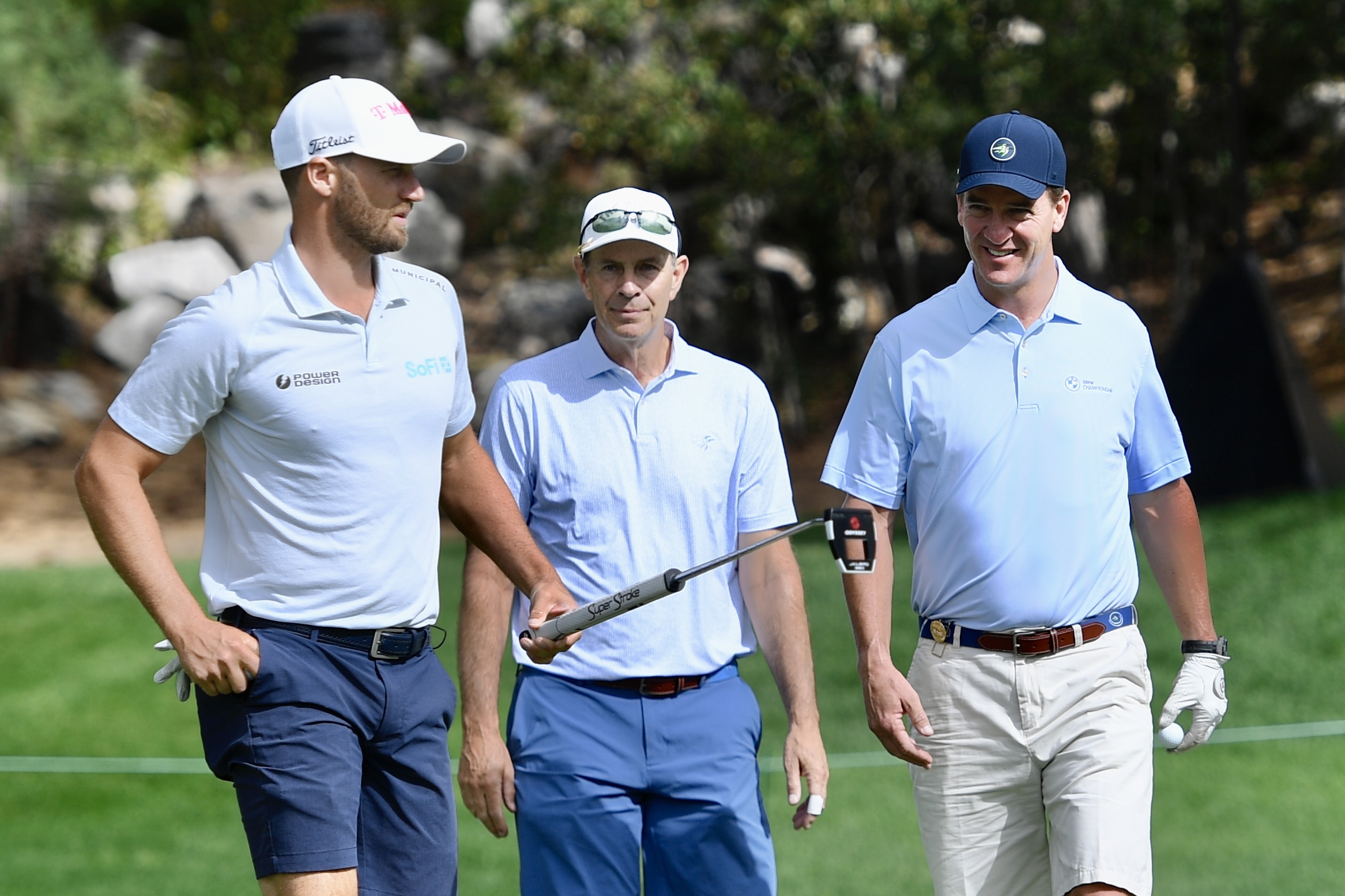 Wyndham Clark walks with Peyton Manning on the first green at Castle Pines Golf Club at Wednesday's BMW Championship pro-am on Aug. 21, 2024. (CarsonFieldcarson.field@gazette.comhttps://secure.gravatar.com/avatar/c524ef3d384945349bed78d70eb2d2cd?d=mm&r=g)