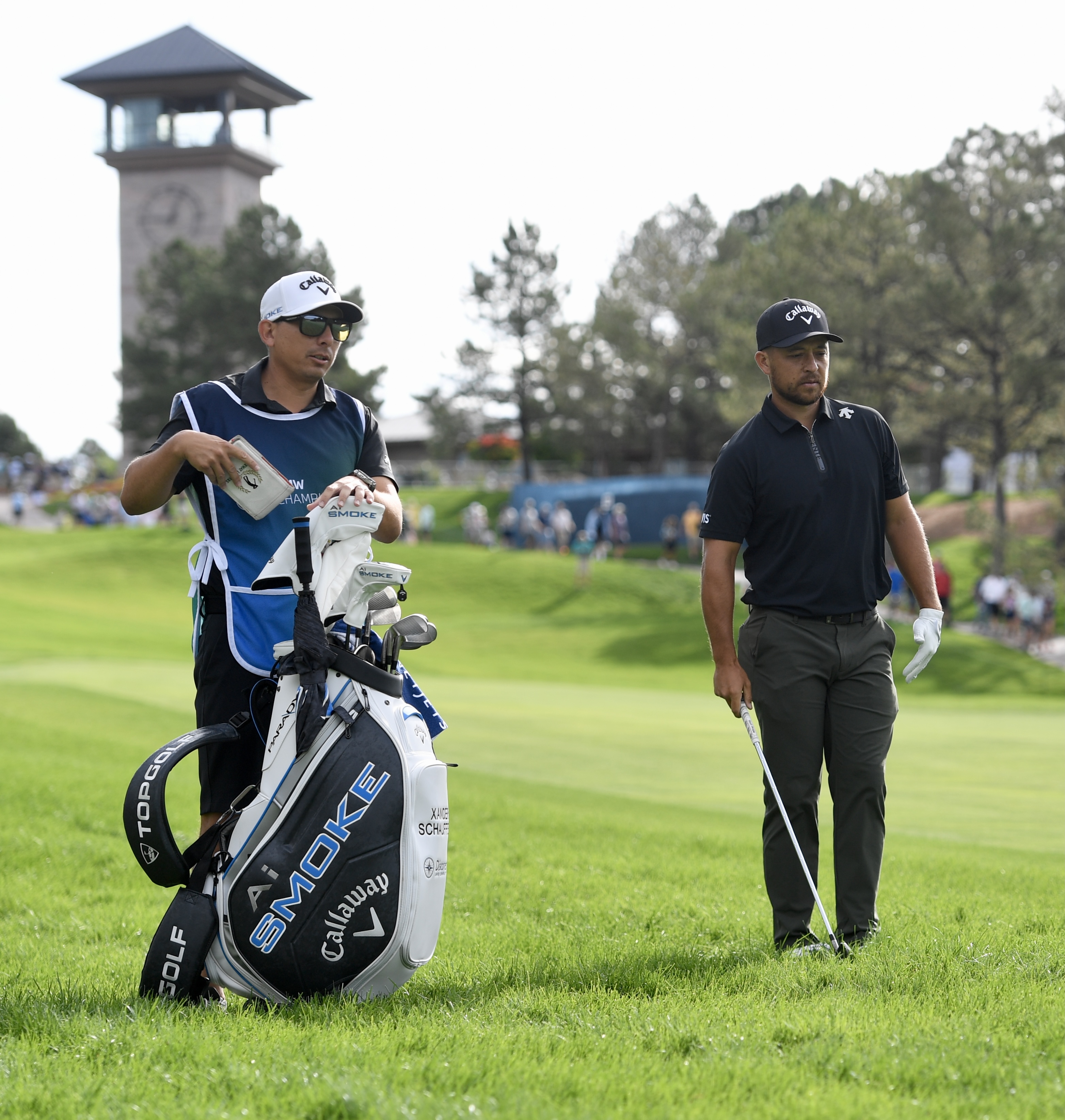 Xander Schauffele prepares for a shot with caddie Austin Kisser at Castle Pines Golf Club during the first round of the BMW Championship on Thursday, Aug. 22, 2024. (Carson Field, The Gazette) (CarsonFieldcarson.field@gazette.comhttps://secure.gravatar.com/avatar/c524ef3d384945349bed78d70eb2d2cd?d=mm&r=g)