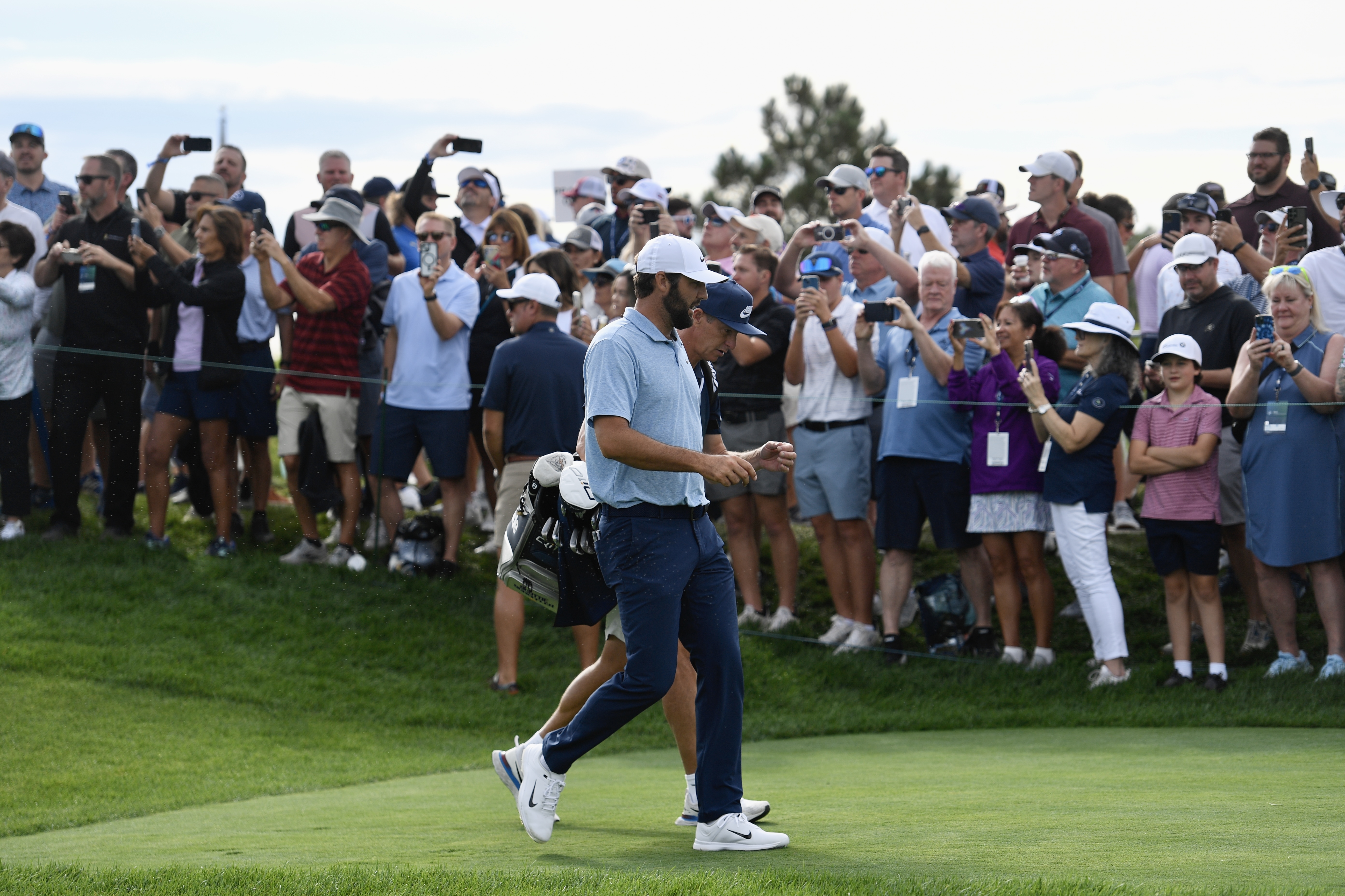 Scottie Scheffler walks down the first fairway at Castle Pines Golf Club during the first round of the BMW Championship on Thursday, Aug. 22, 2024. (Carson Field, The Gazette) (CarsonFieldcarson.field@gazette.comhttps://secure.gravatar.com/avatar/c524ef3d384945349bed78d70eb2d2cd?d=mm&r=g)