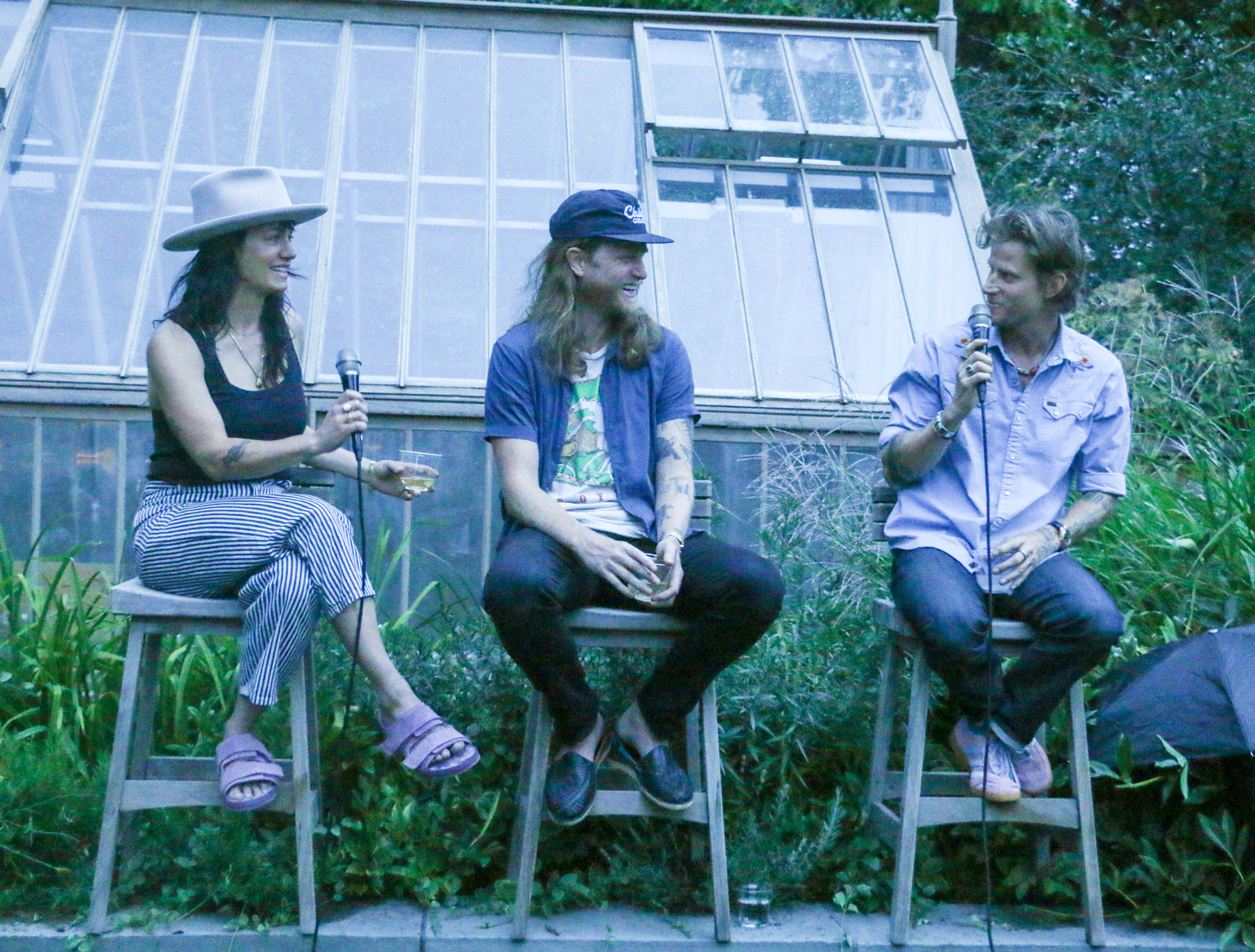Brandy Schultz, left, with husband Wesley Schultz, lead singer of The Lumineers, and friend Cory Richards, author of the new book