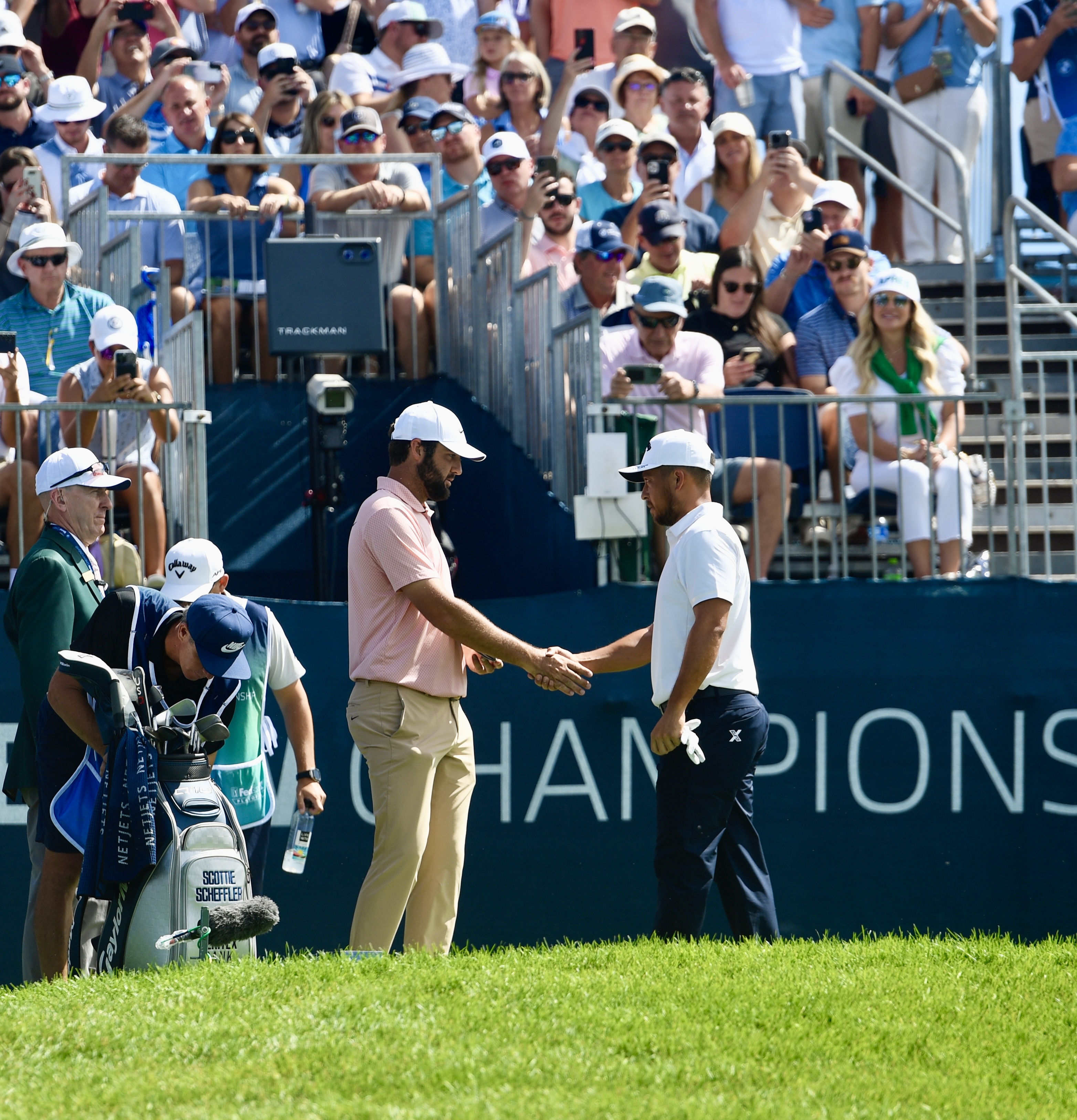 Scottie Scheffler and Xander Schauffele shake hands at Castle Pines Golf Club before the second round of the BMW Championship on Friday, Aug. 23, 2024. (CarsonFieldcarson.field@gazette.comhttps://secure.gravatar.com/avatar/c524ef3d384945349bed78d70eb2d2cd?d=mm&r=g)