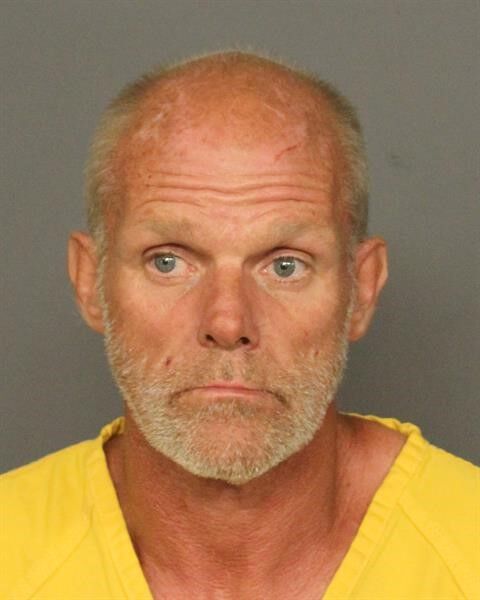 Brian Mervin, 50, was arrested by the Denver Police Department on Monday on suspicion of first-degree murder in the death of his wife. Investigators found that the wife's injuries were indicative of assault. (Courtesy of the Denver Police Department)
