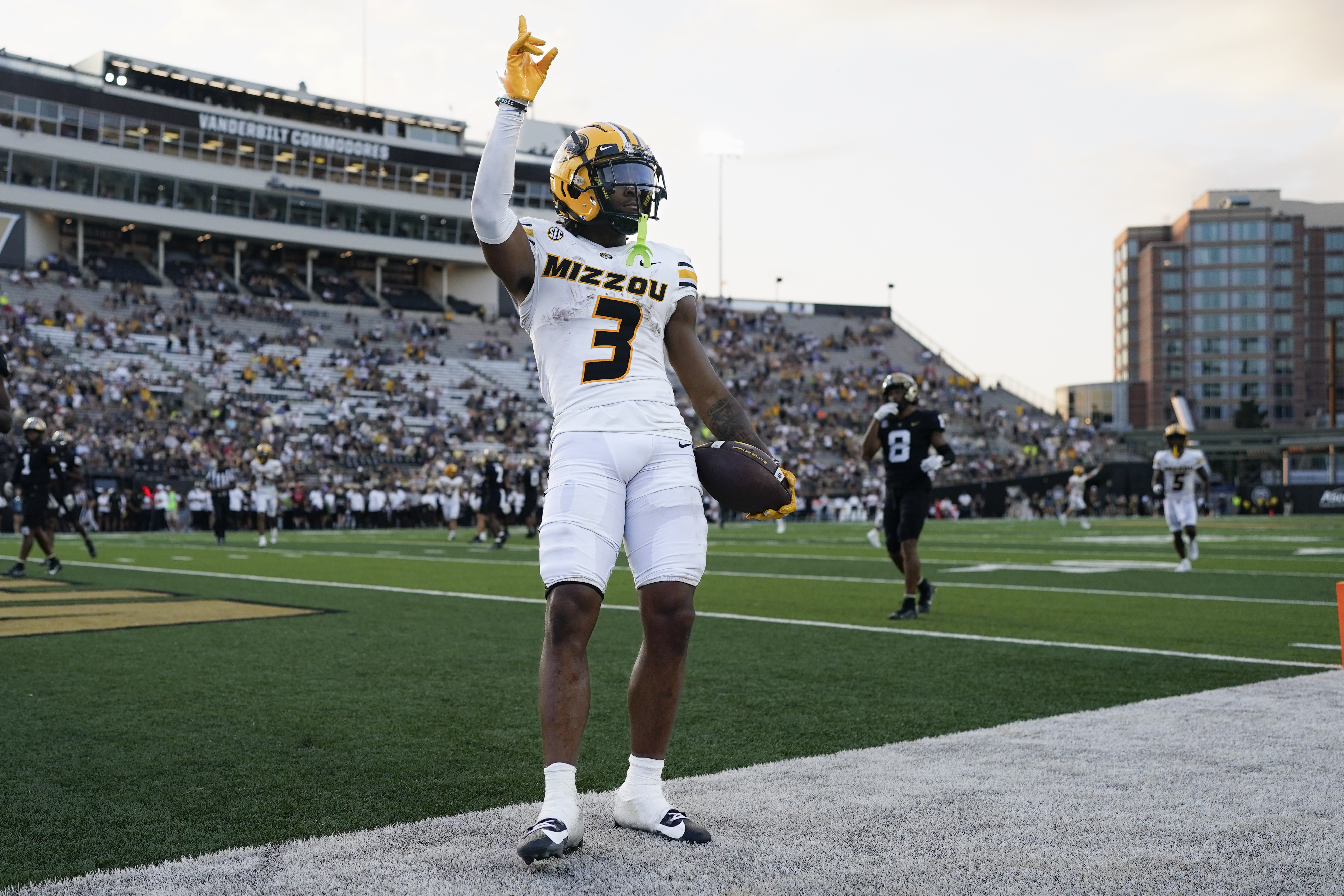 Missouri wide receiver Luther Burden III (3) celebrates a touchdown against Vanderbilt in the second half of an NCAA college football game Saturday, Sept. 30, 2023, in Nashville, Tenn. (AP Photo/George Walker IV) (George Walker IV)