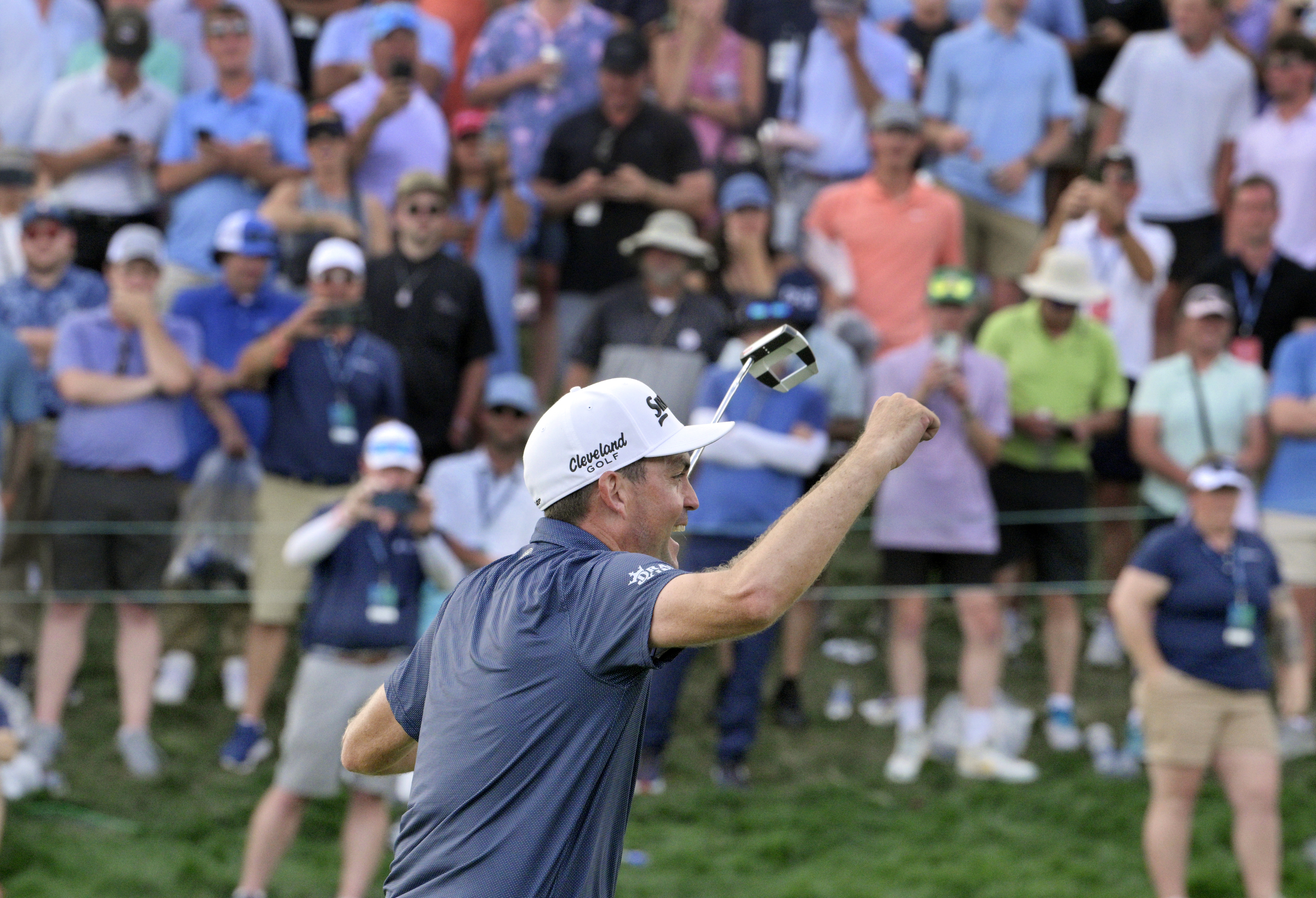 Keegan Bradley celebrates with the crowd after winning the 2024 BMW Championship on Sunday, August 25, 2024. Bradley won the competition with a score of 12 under.