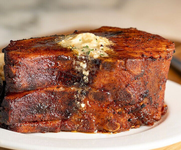 Perry’s Steakhouse & Grill in Denver celebrates National Pork Chop Day with a 18-ounce pork chop special. Courtesy photo (Courtesy)