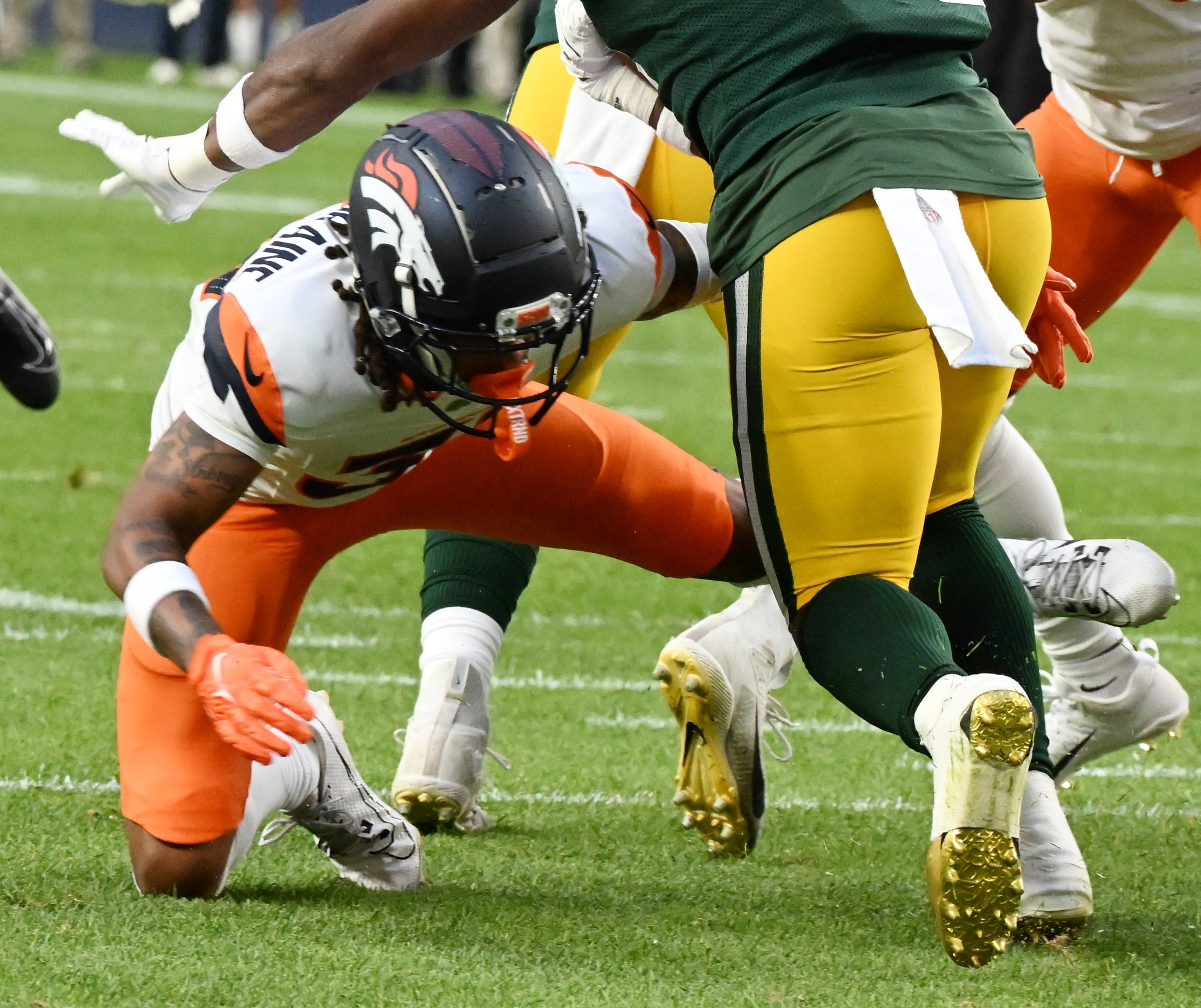 Denver Broncos cornerback Kris Abrams-Draine (31) makes a tackle during a preseason game against the Packers on Sunday, Aug. 18, 2024. The Broncos won the game 27-2. (Jerilee Bennett, The Gazette)