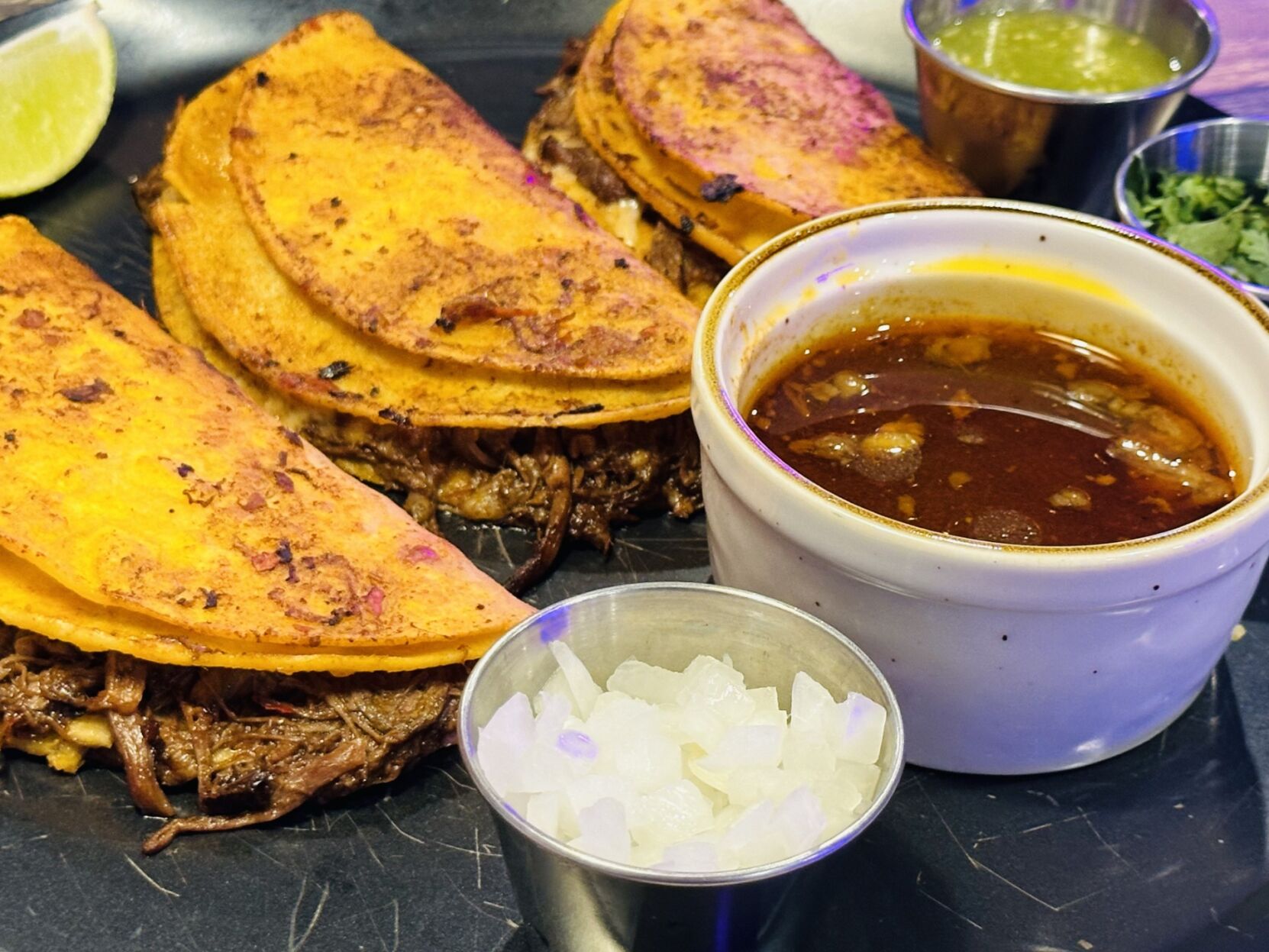 Birria taco plate served at Por Favor Tacos & Tragos. (TeresaFarneyteresa.farney@gazette.comhttps://secure.gravatar.com/avatar/5fa6e85609aee138712caf960aaf3354?d=mm&r=g)