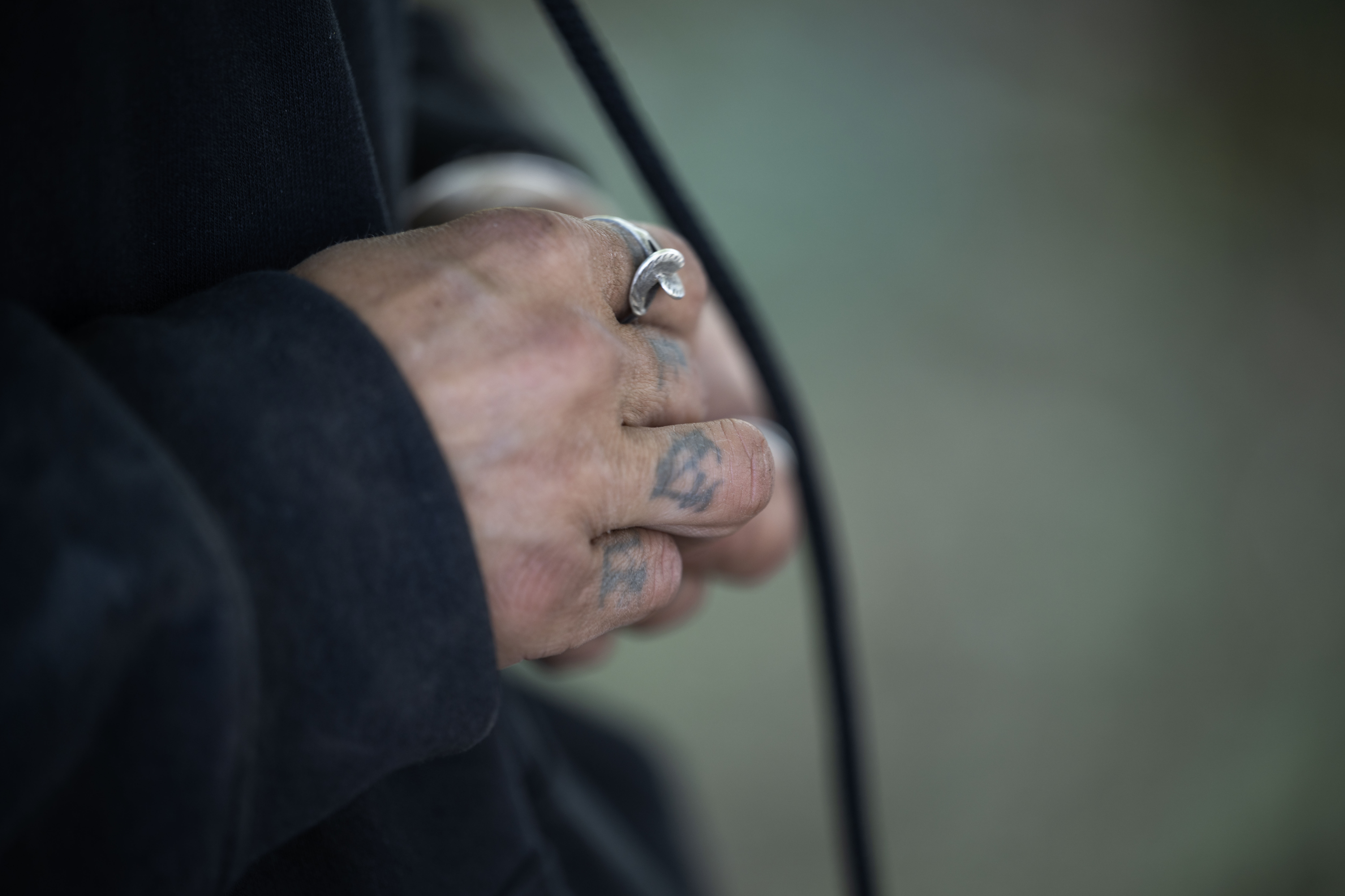 “The only things you can keep are the things you wear,” said Casey Horn, as she looked for one of her mother's rings that fell off while she slept. Horn and others in her encampment, on the corner of 38th and Fox, packed up their things and move from their site during a sweep on Thursday, June 13, 2024. (StephenSwoffordPhotographerstephen.swofford@gazette.comhttps://secure.gravatar.com/avatar/1ddcaf11c5d70eaa58546ddc4e038687?d=mm&r=g)